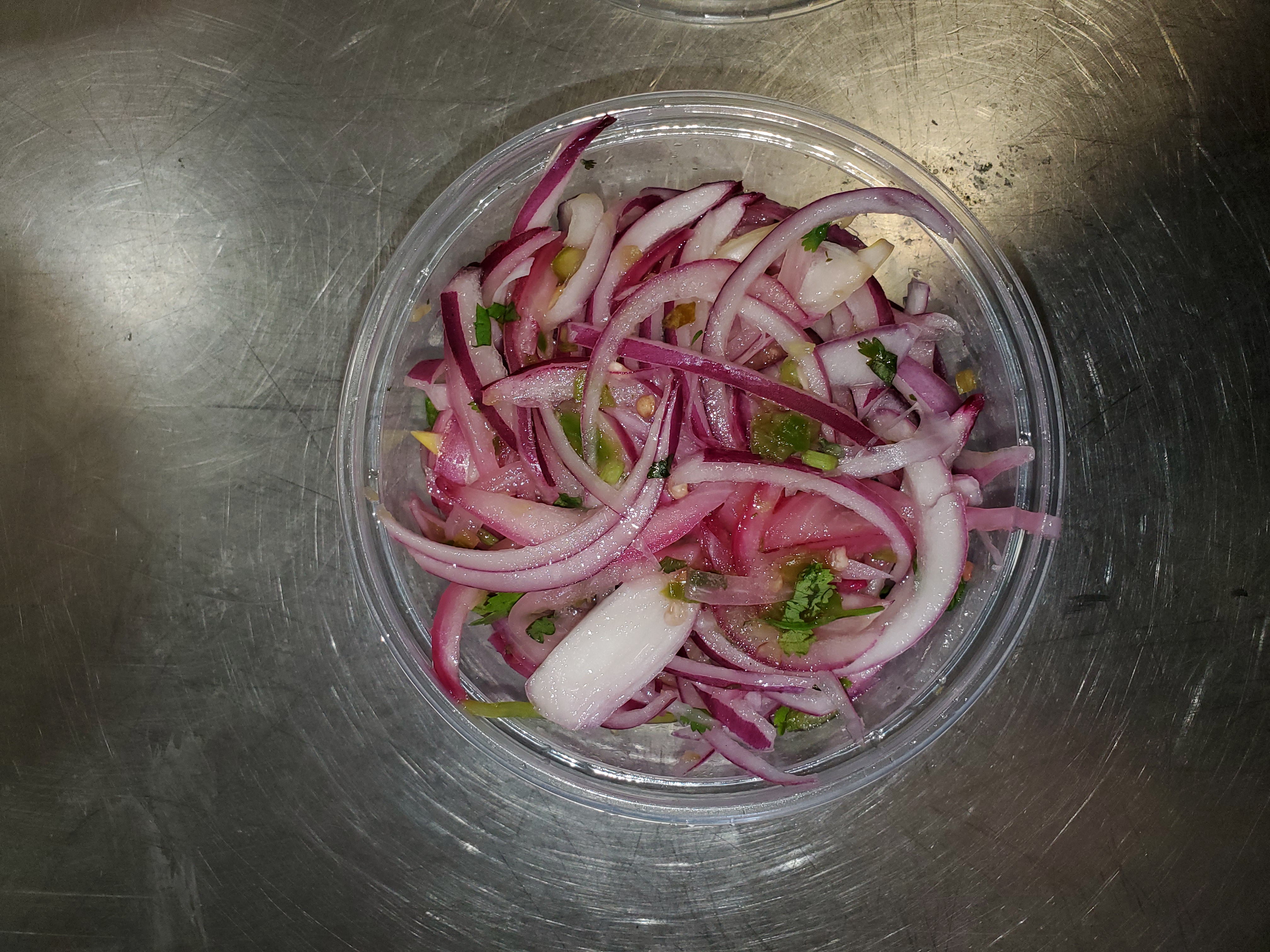 Order  8 oz Onion Salad food online from Shirleys India store, New Rochelle on bringmethat.com
