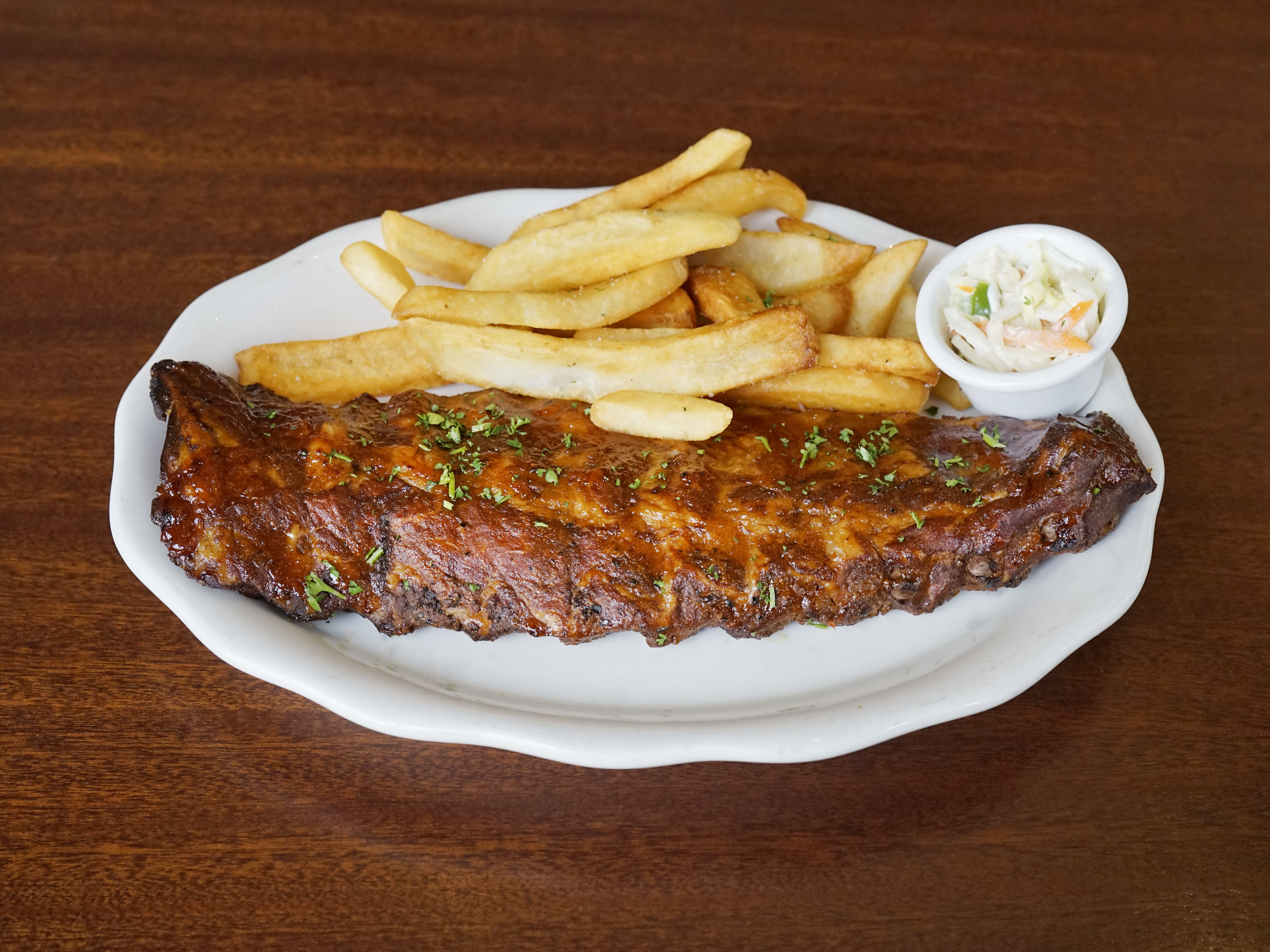 Order St Louis Cut Guinness Ribs food online from Houndstooth Pub store, New York on bringmethat.com