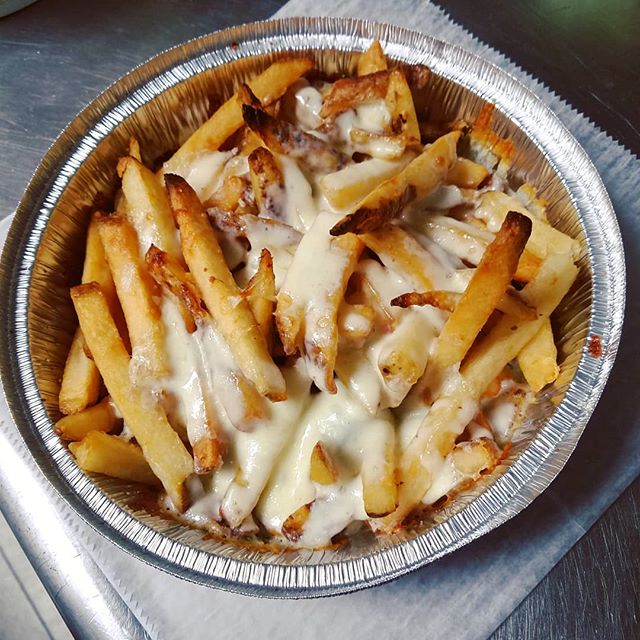Order Cheesy Fries food online from Nino's Pizza store, Boston on bringmethat.com