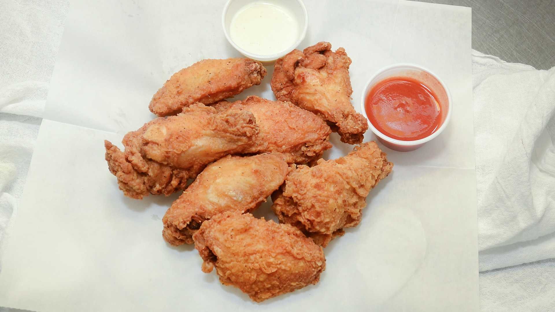 Order Wings - 10 Pieces food online from Original Buscemi store, Troy on bringmethat.com