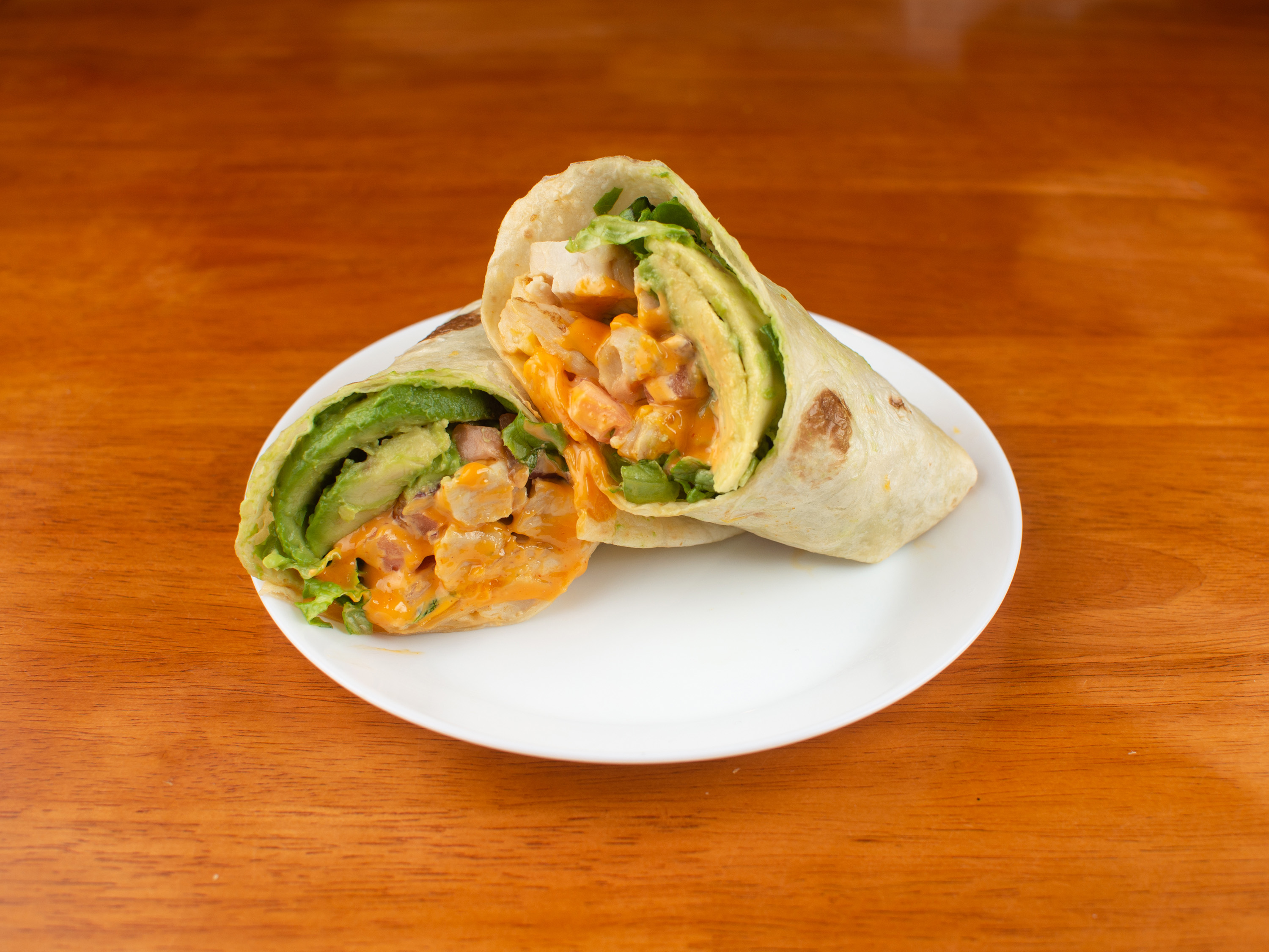 Order Chicken Avocado Wrap food online from Bobby Bagel Cafe store, Herndon on bringmethat.com