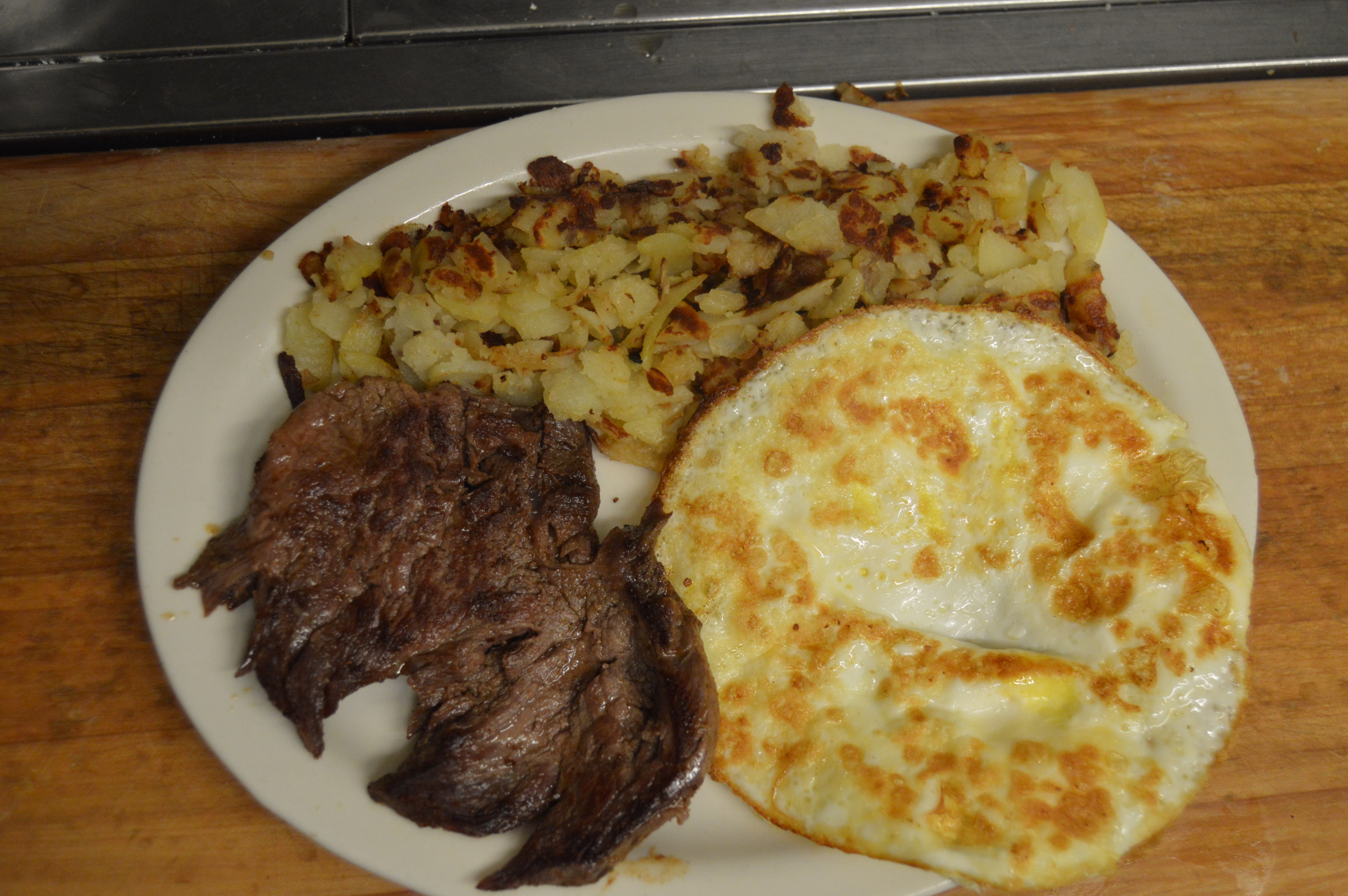 Order Delmonico Steak and 3 Eggs (8 oz) food online from Angelas Family Restaurant store, Cleveland on bringmethat.com