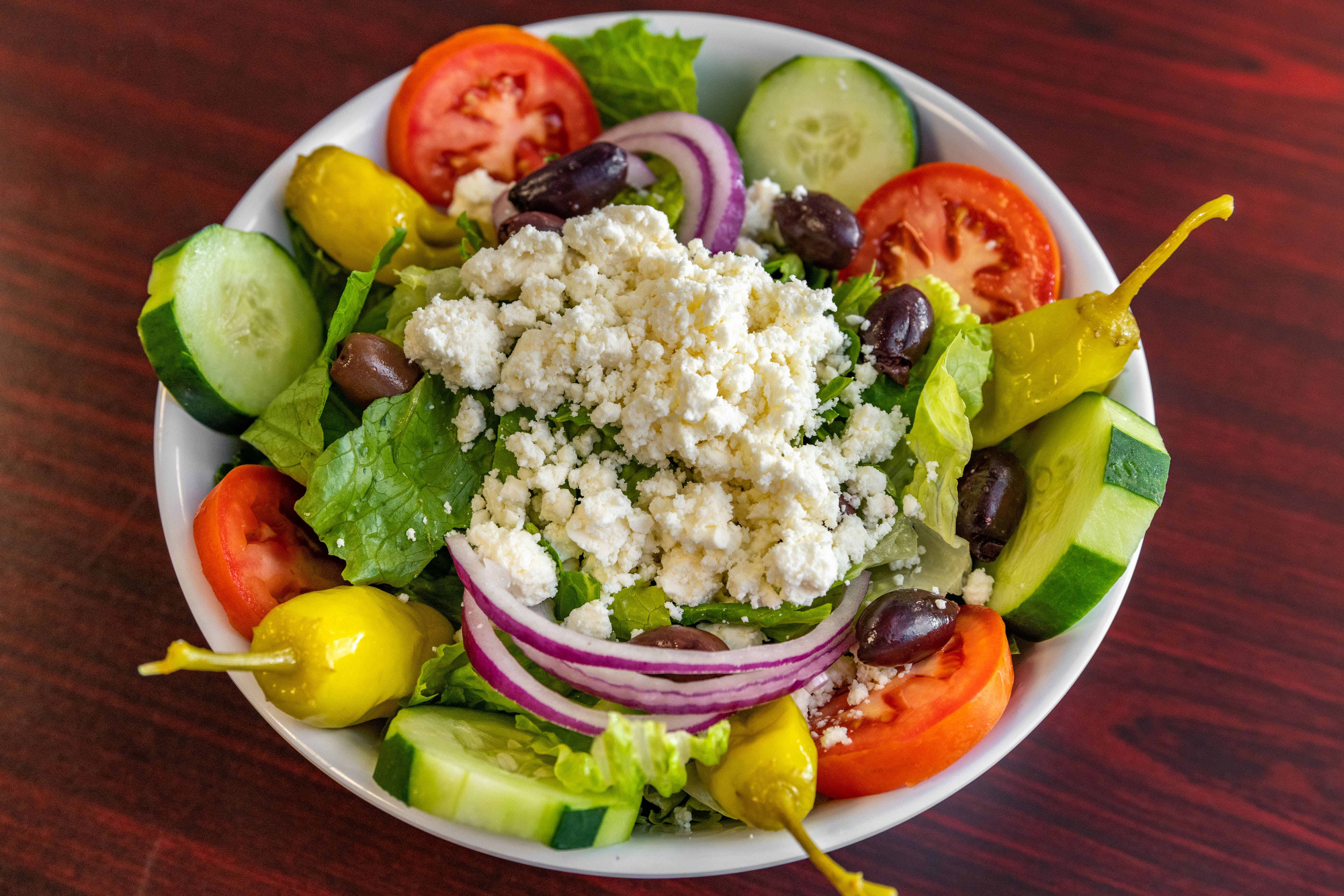 Order Greek Salad - Salads food online from East Side Pizza store, Lantana on bringmethat.com