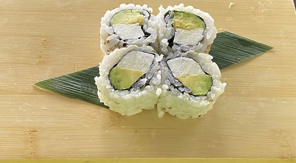 Order Avocado Cream Cheese Roll - 4 Pieces food online from Sushi Train store, Minneapolis on bringmethat.com