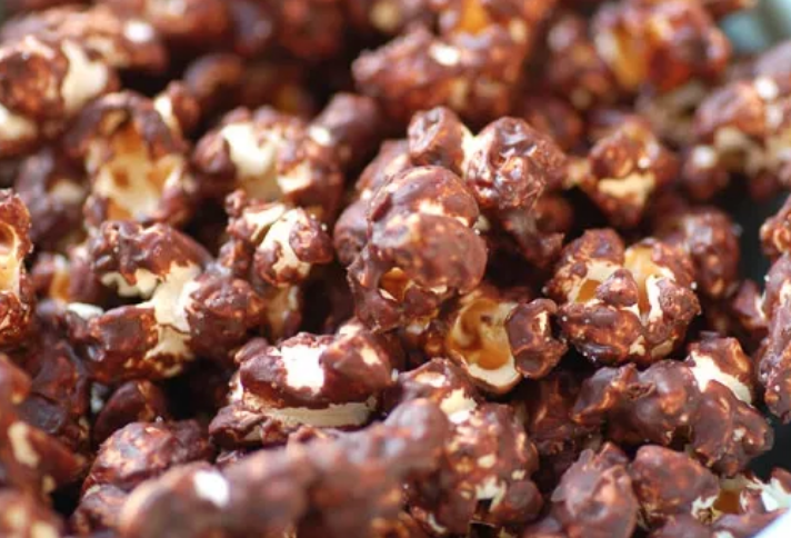 Order Milk Chocolate Popcorn food online from What's Poppin Texas store, Bedford on bringmethat.com