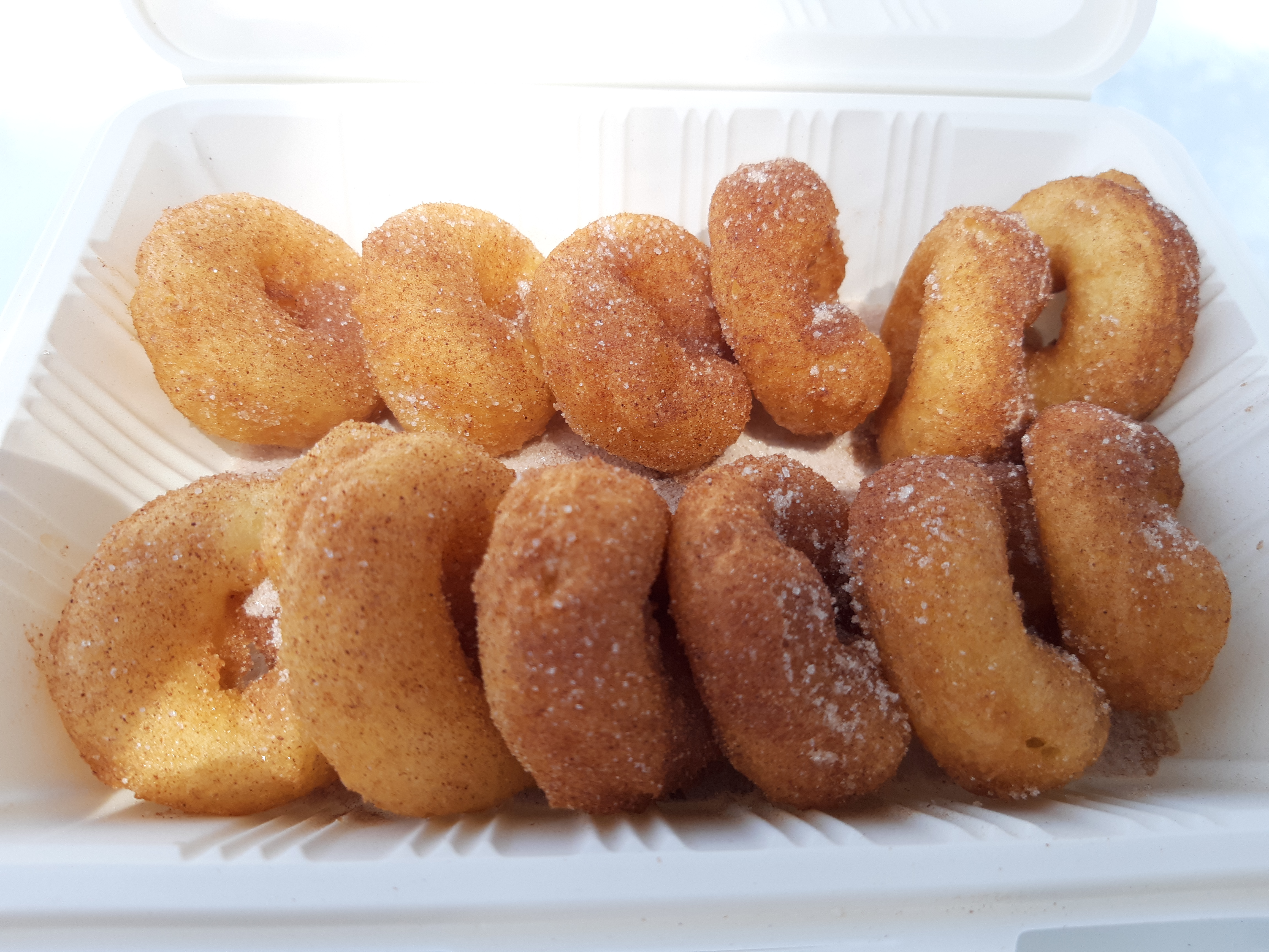 Order One Dozen Miniature Donuts food online from Dolfo Donuts store, El Dorado Hills on bringmethat.com