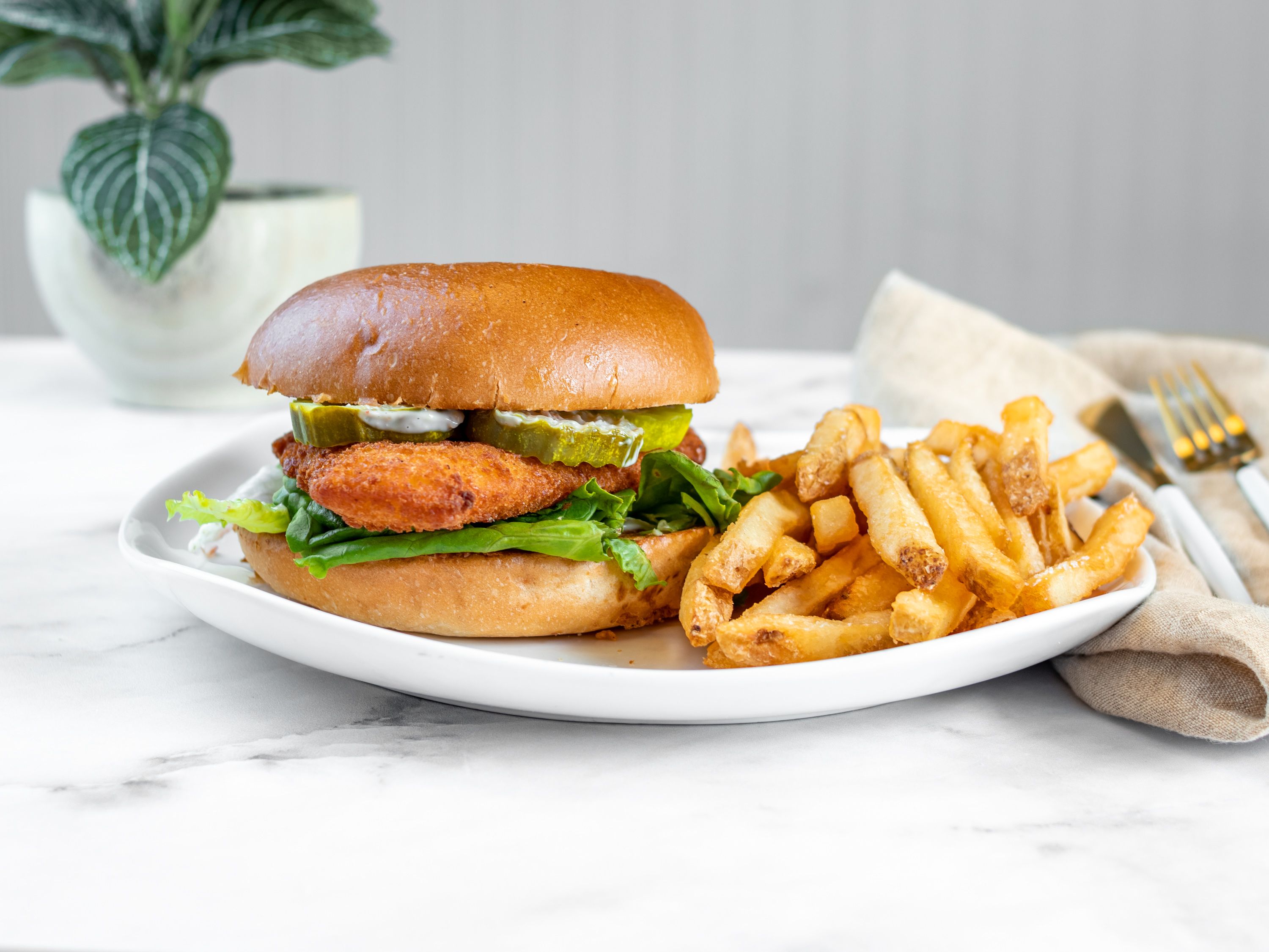 Order Fish Sandwich food online from The Kitchen Takeout store, Norristown on bringmethat.com