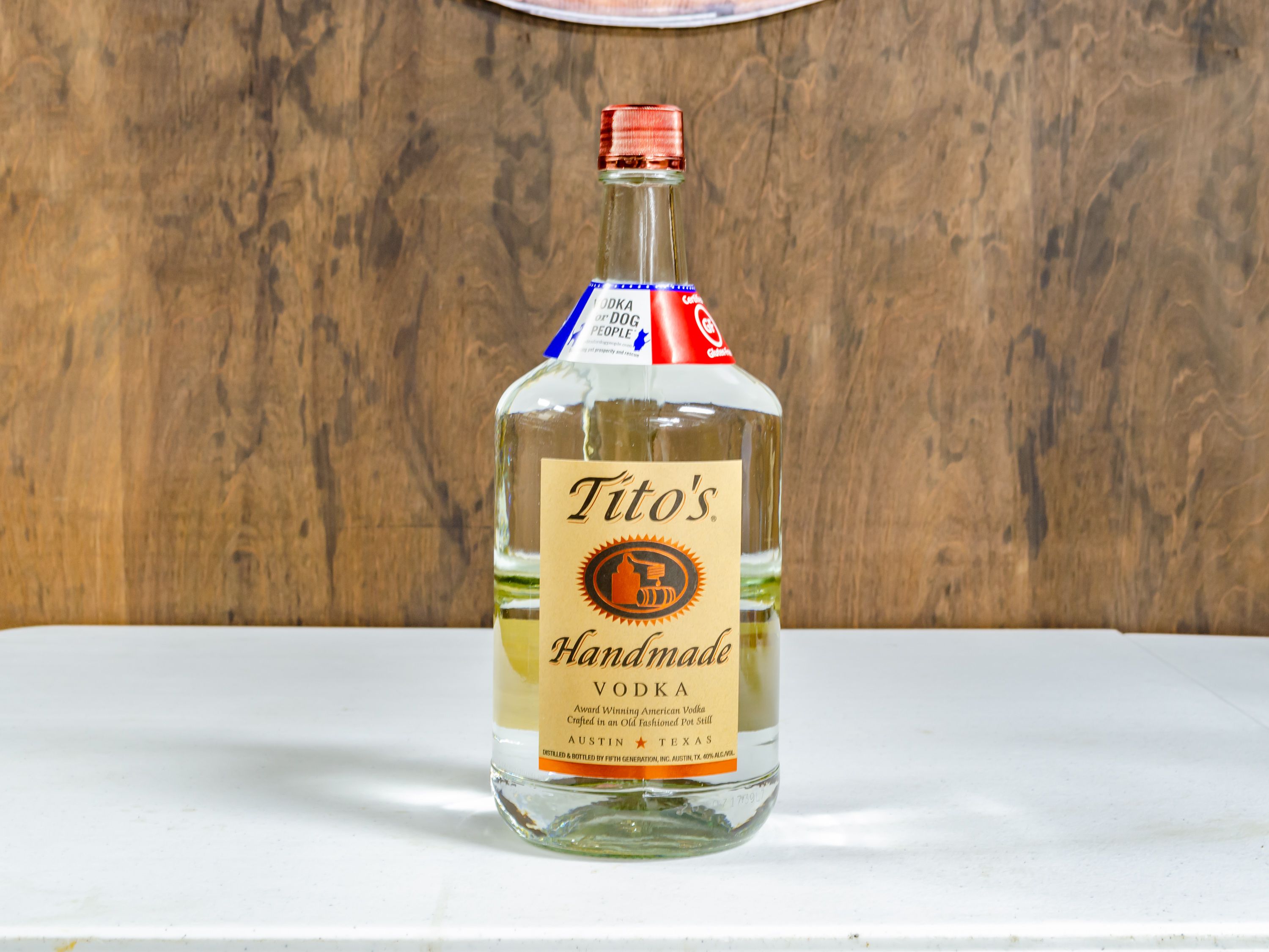 Order Tito's, 1.75 Liter Vodka food online from Liquorama store, Hyde Park on bringmethat.com