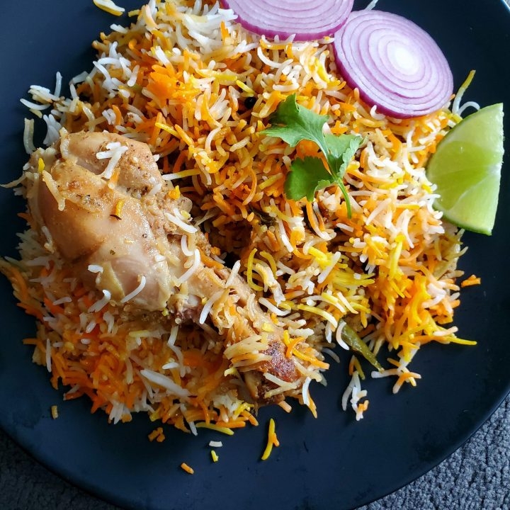 Order Hyderabadi Chicken Dum Biryani food online from Madras Cafe store, San Diego on bringmethat.com