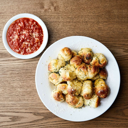 Order Mini Garlic Knots food online from Johnny's New York Style Pizza store, Flowery Branch on bringmethat.com