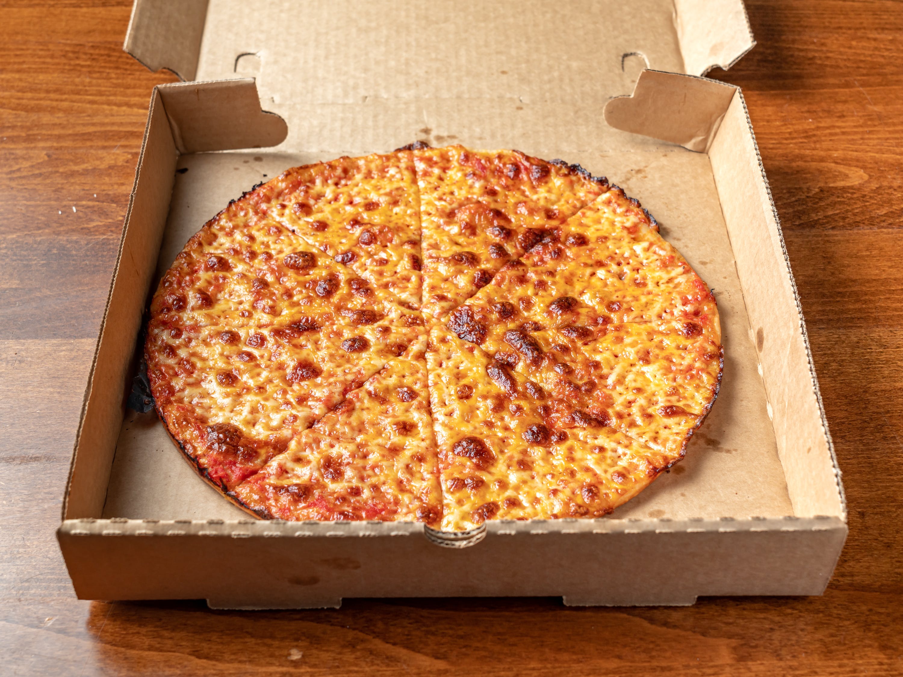 Order Plain Cheese Pizza - Individual 12" (8 Slices) food online from Beekman Ale House store, Sleepy Hollow on bringmethat.com