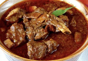 Order Andhara Goat Curry food online from Oasis Multicuisine store, Baton Rouge on bringmethat.com