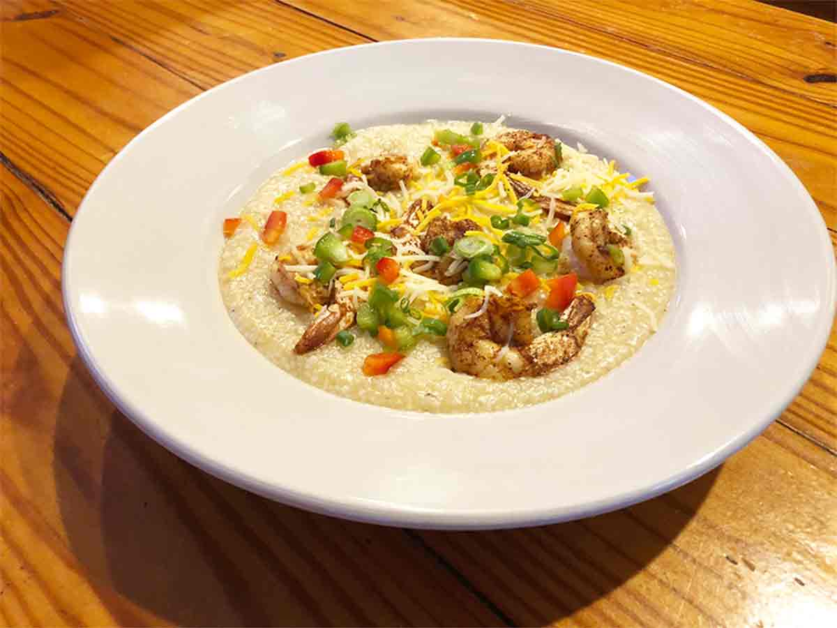 Order Shrimp and Grits food online from Cajun Crab store, Irving on bringmethat.com