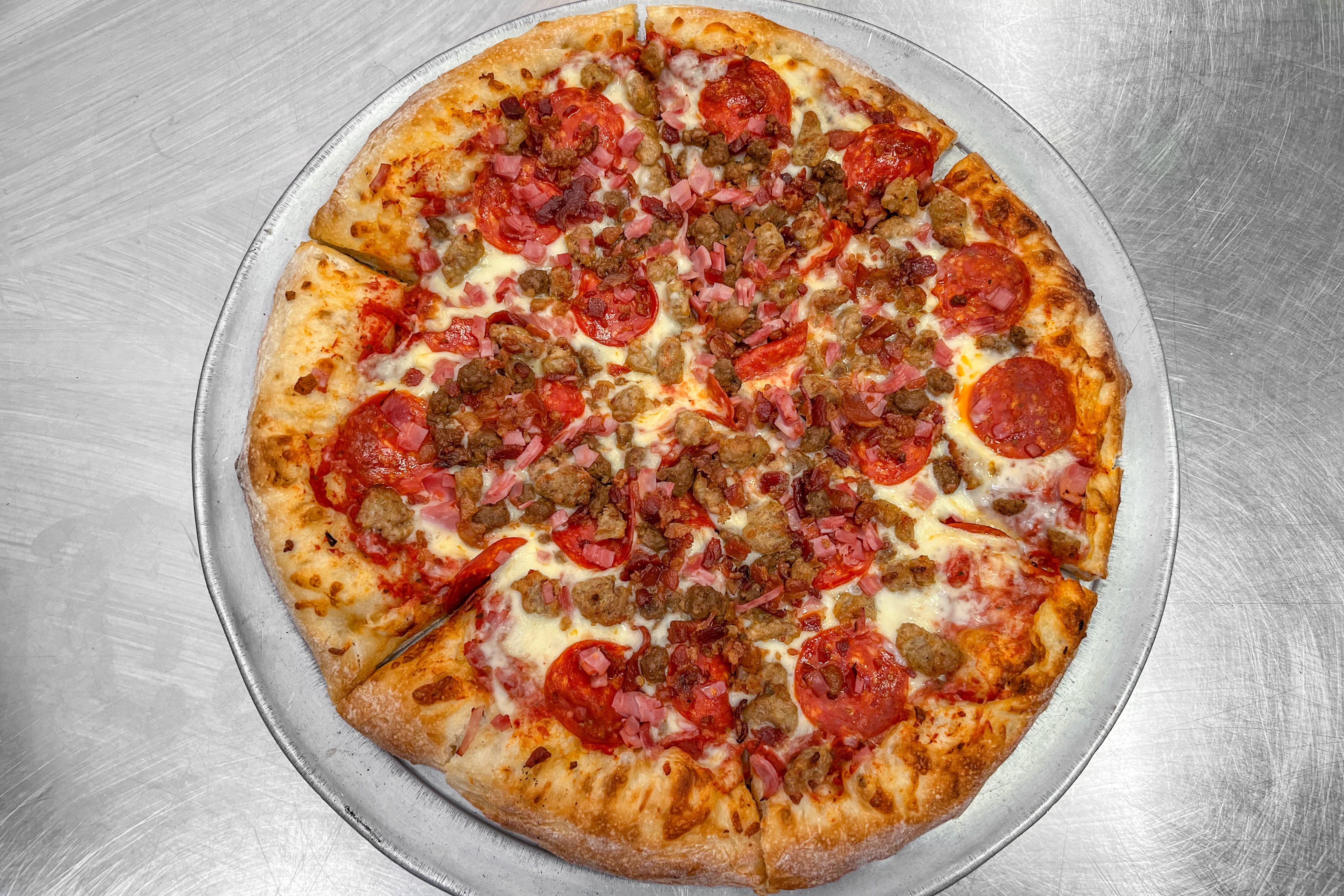 Order Meat Pizza - Small 10'' food online from Party Express store, Port Huron on bringmethat.com