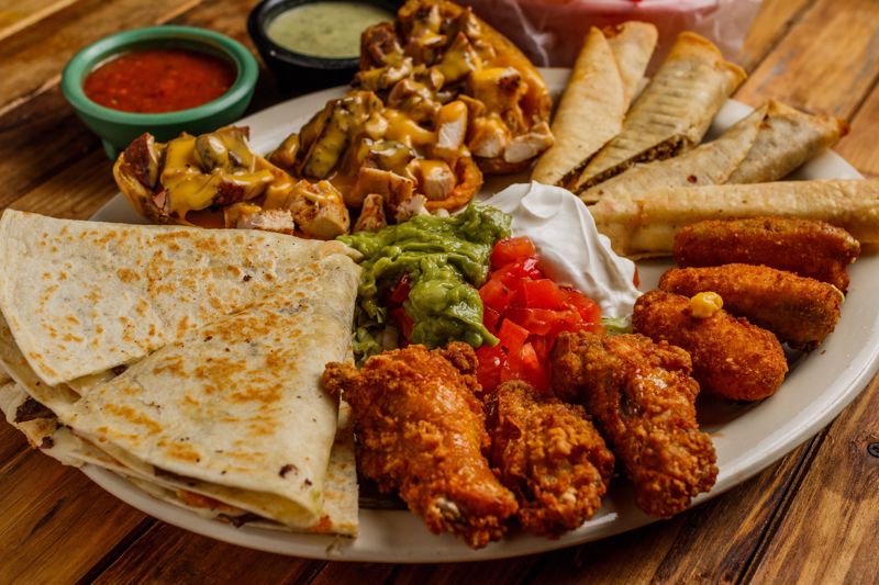 Order Fiesta Platter food online from Cilantros Mexican Restaurant store, Houston on bringmethat.com