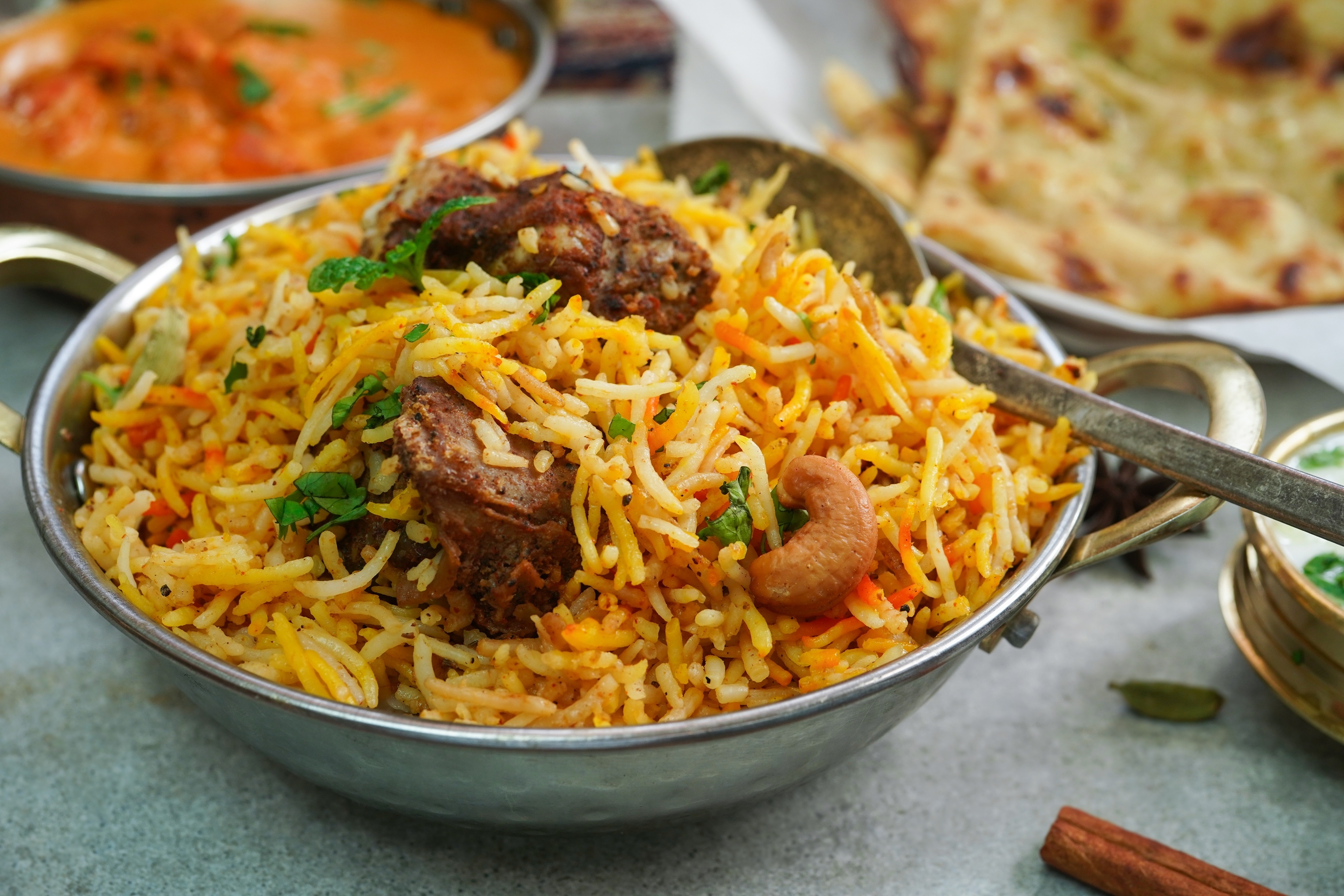Order Goat  Briyani (Bone-In) food online from Tropical Curry And Grill store, Pflugerville on bringmethat.com