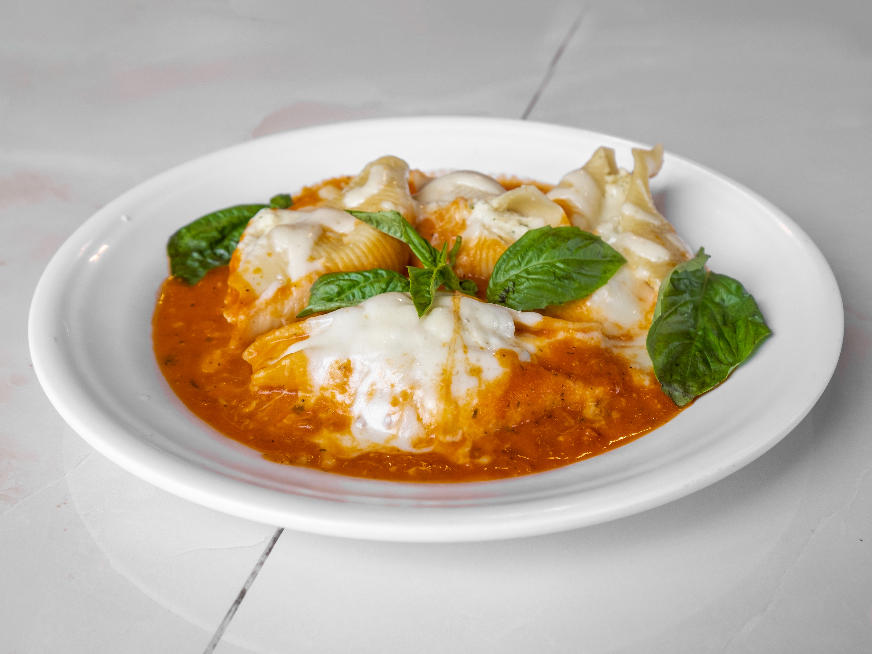 Order Stuffed Shells food online from New Yorker Pizza store, Leesburg on bringmethat.com