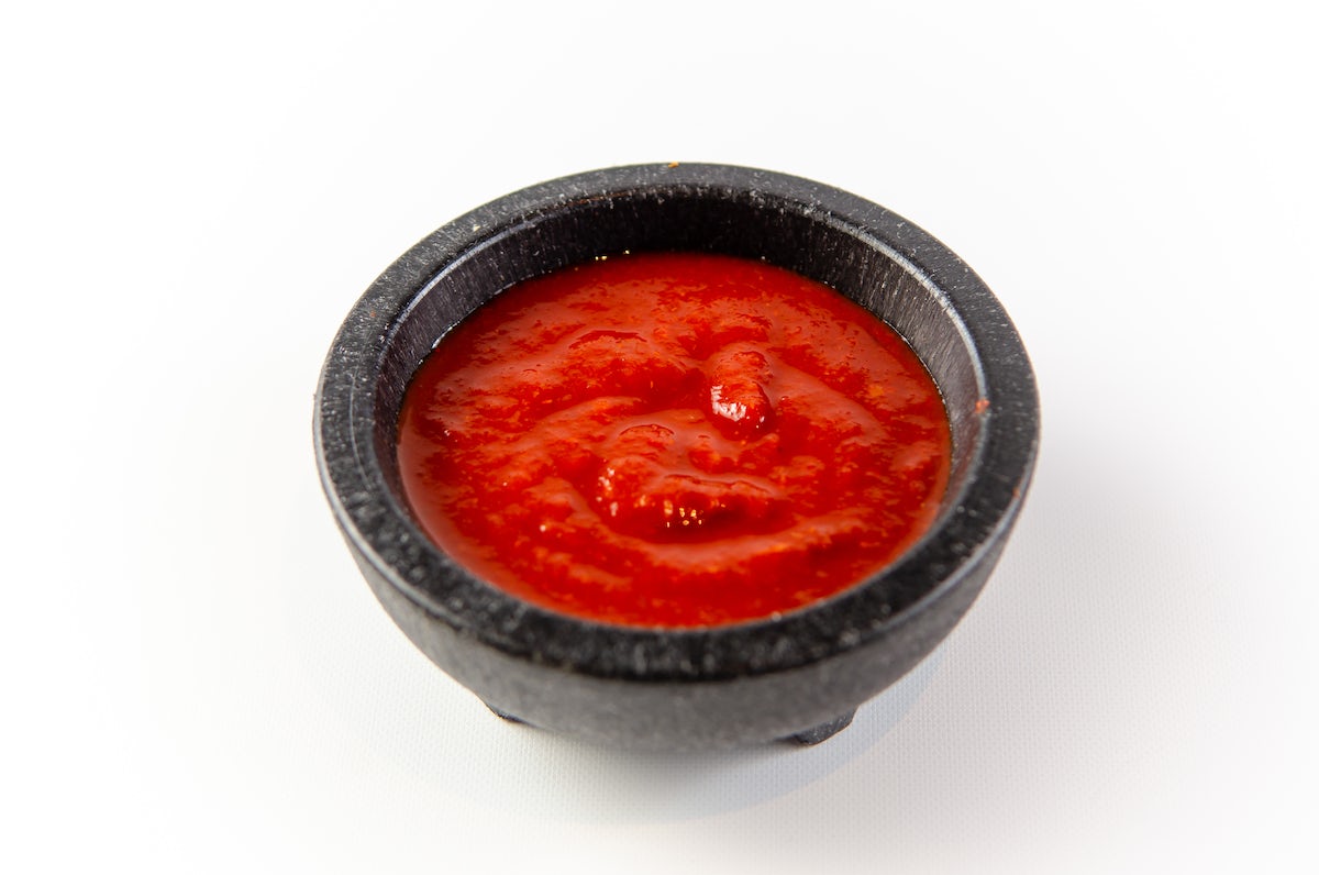 Order Desi Hot Sauce food online from Curry Up Now store, Oakland on bringmethat.com