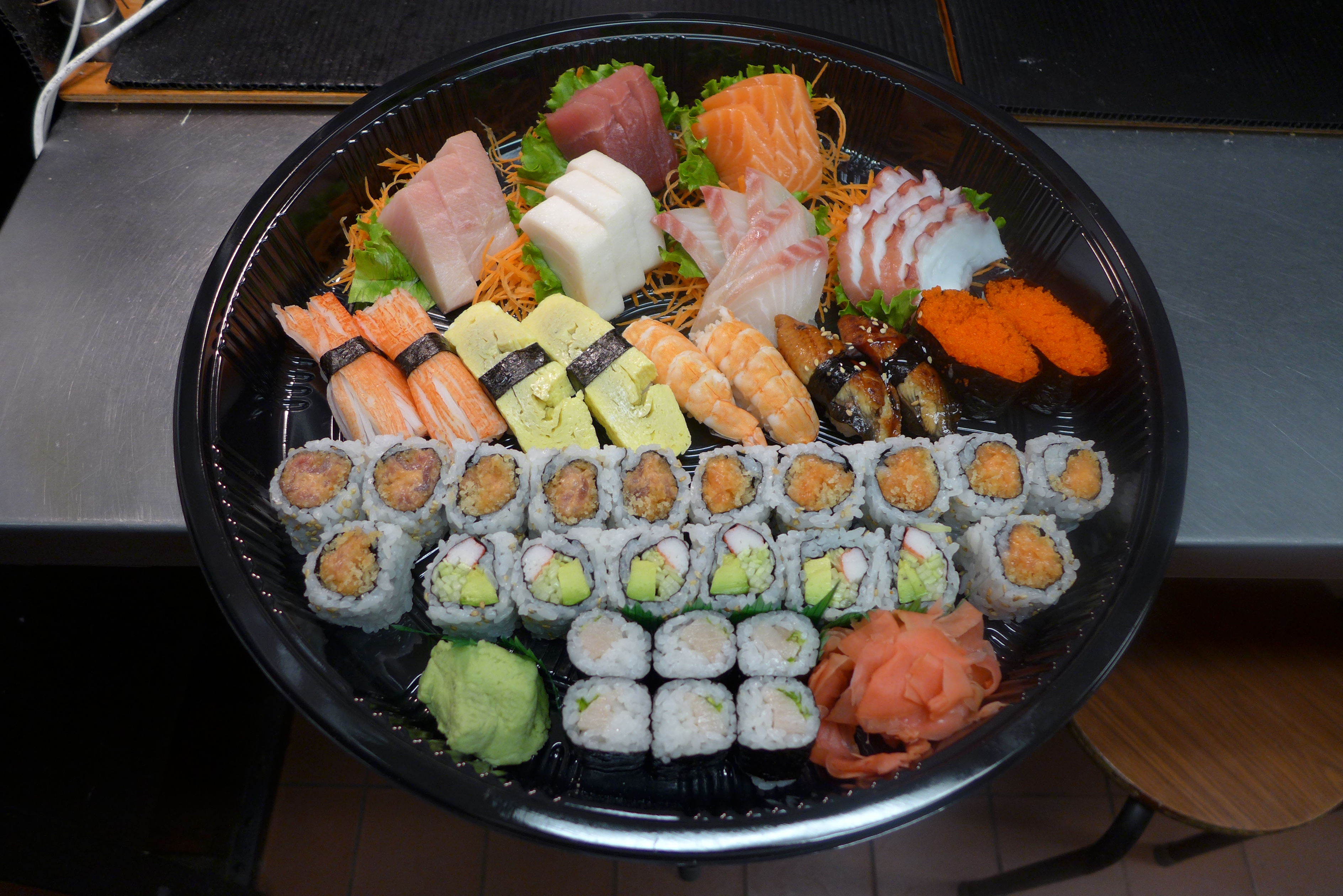 Order 18 Piece Sashimi, 10 Piece Sushi and 4 Rolls Party Tray D food online from Tokyo Sushi store, Edison on bringmethat.com