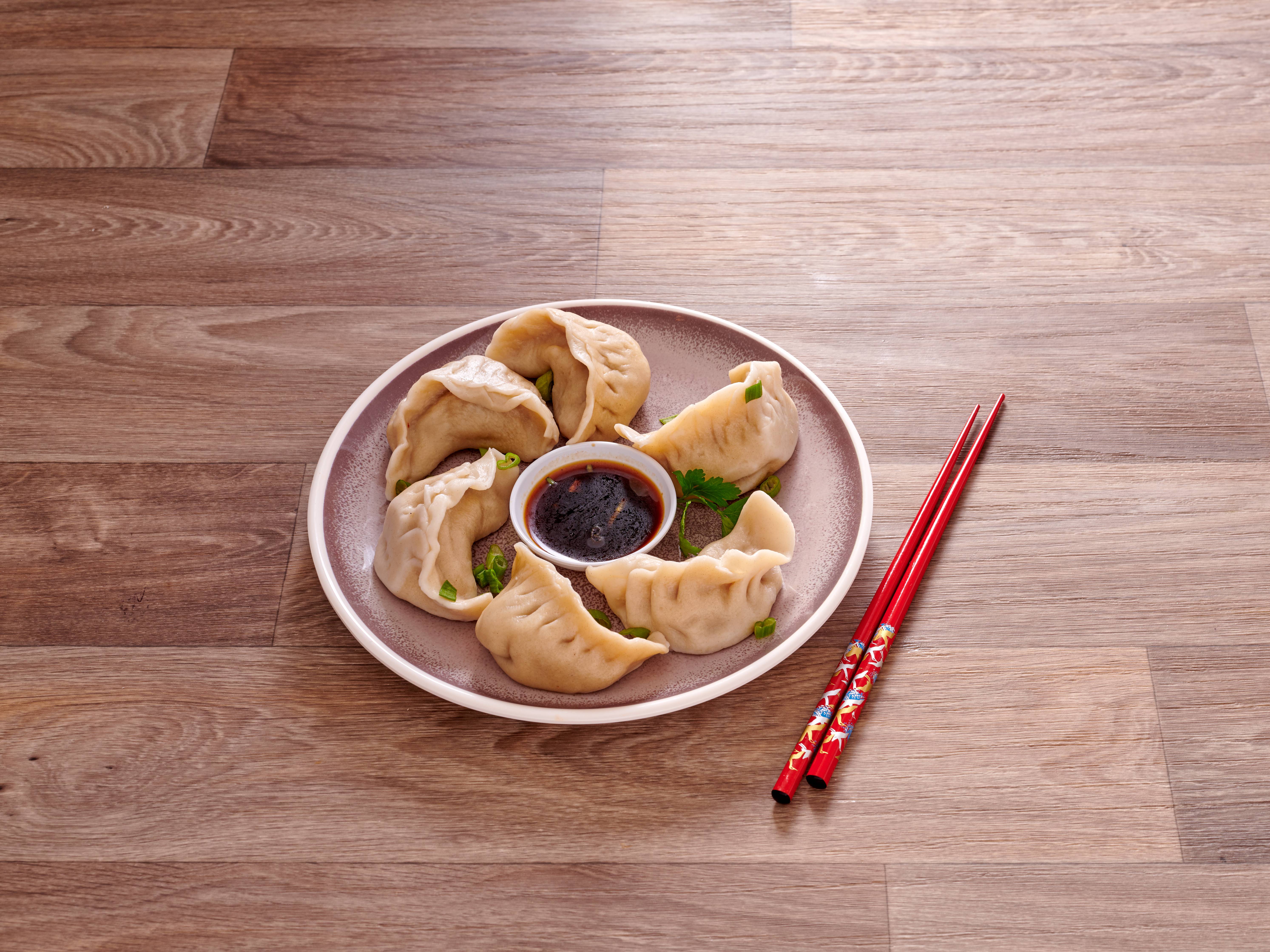 Order 4. Pork Dumpling food online from China Cafe store, Alexandria on bringmethat.com