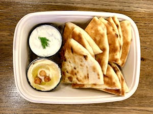 Order Grilled Pita(2) & Dips(2) Plate food online from Athenian Fresh Grill store, North Arlington on bringmethat.com