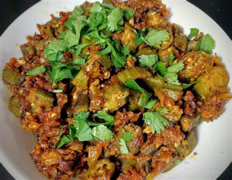 Order Bhindi (Okra) Masala (Add Rice, Naan, Puri in 1) food online from Biryani Pointe store, Lombard on bringmethat.com