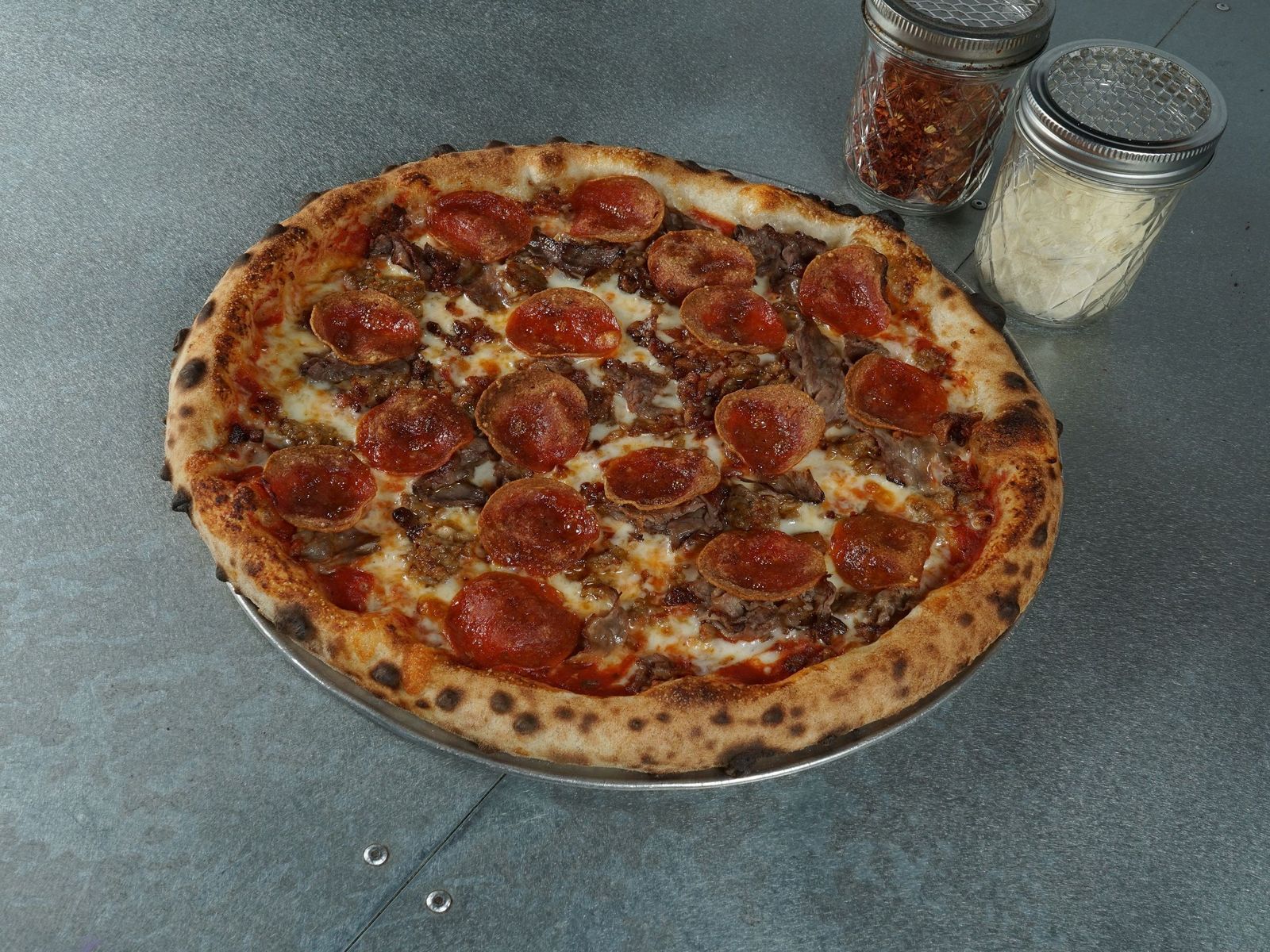 Order 12" aPizzaCo The Meats Pizza food online from Apizzaco store, La Grange on bringmethat.com
