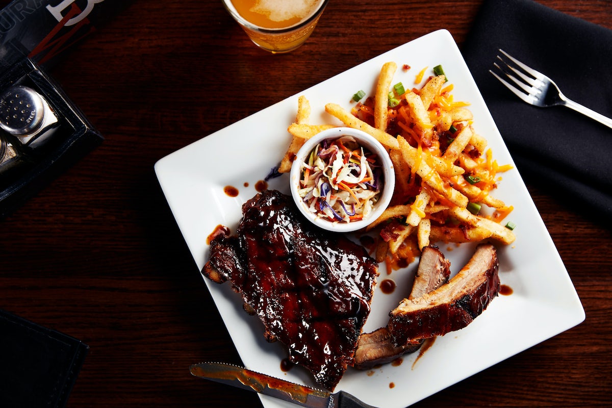 Order BABY BACK RIBS food online from Big Whiskey's American Restaurant & Bar store, Springfield on bringmethat.com