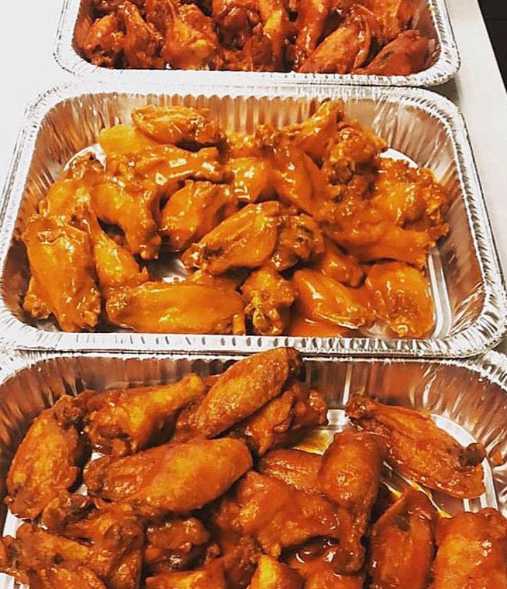 Order Chicken Wings Catering - Half Tray (8-12 People) food online from Lunetta pizza store, New York on bringmethat.com