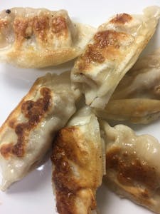 Order Pan Fried Dumplings food online from Lemongrass Cafe store, Louisville on bringmethat.com