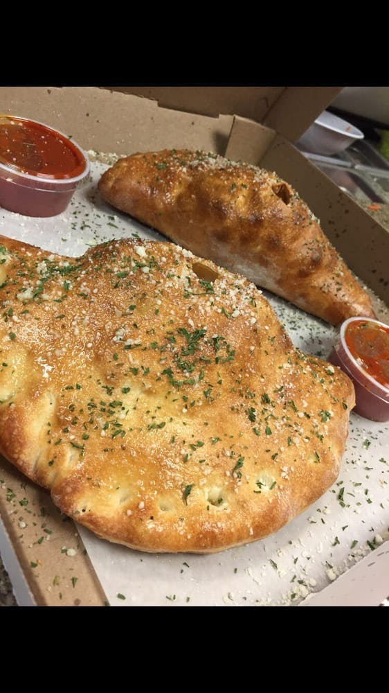 Order Ricotta & Mozzarella Calzone - Calzone food online from Luckys Pizza store, Surprise on bringmethat.com
