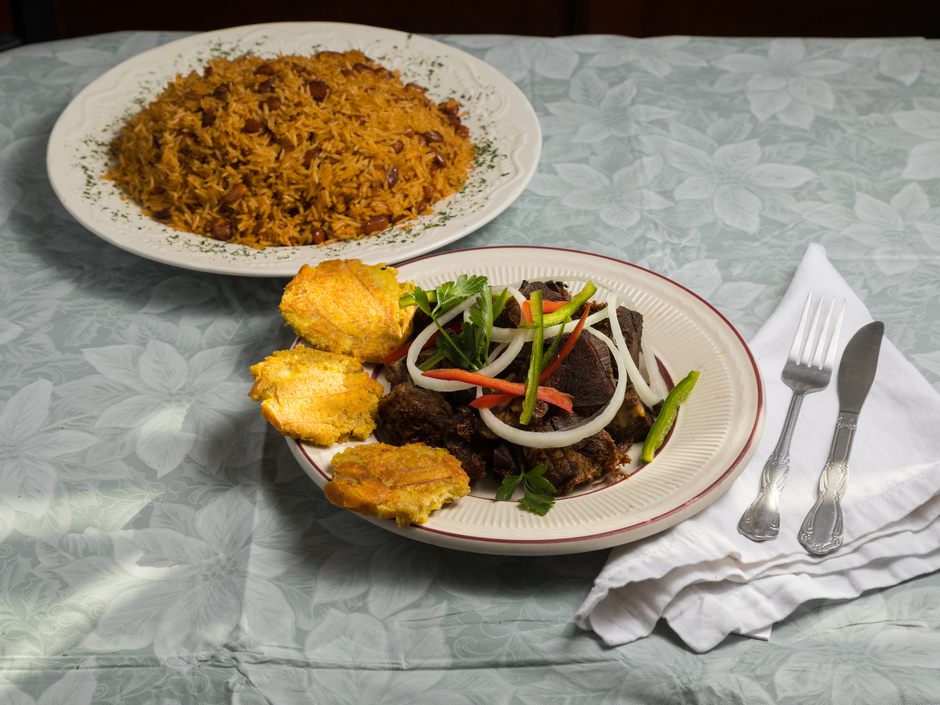 Order Fried Goat with Plantains food online from J&R Restaurant And Bakery store, Malden on bringmethat.com
