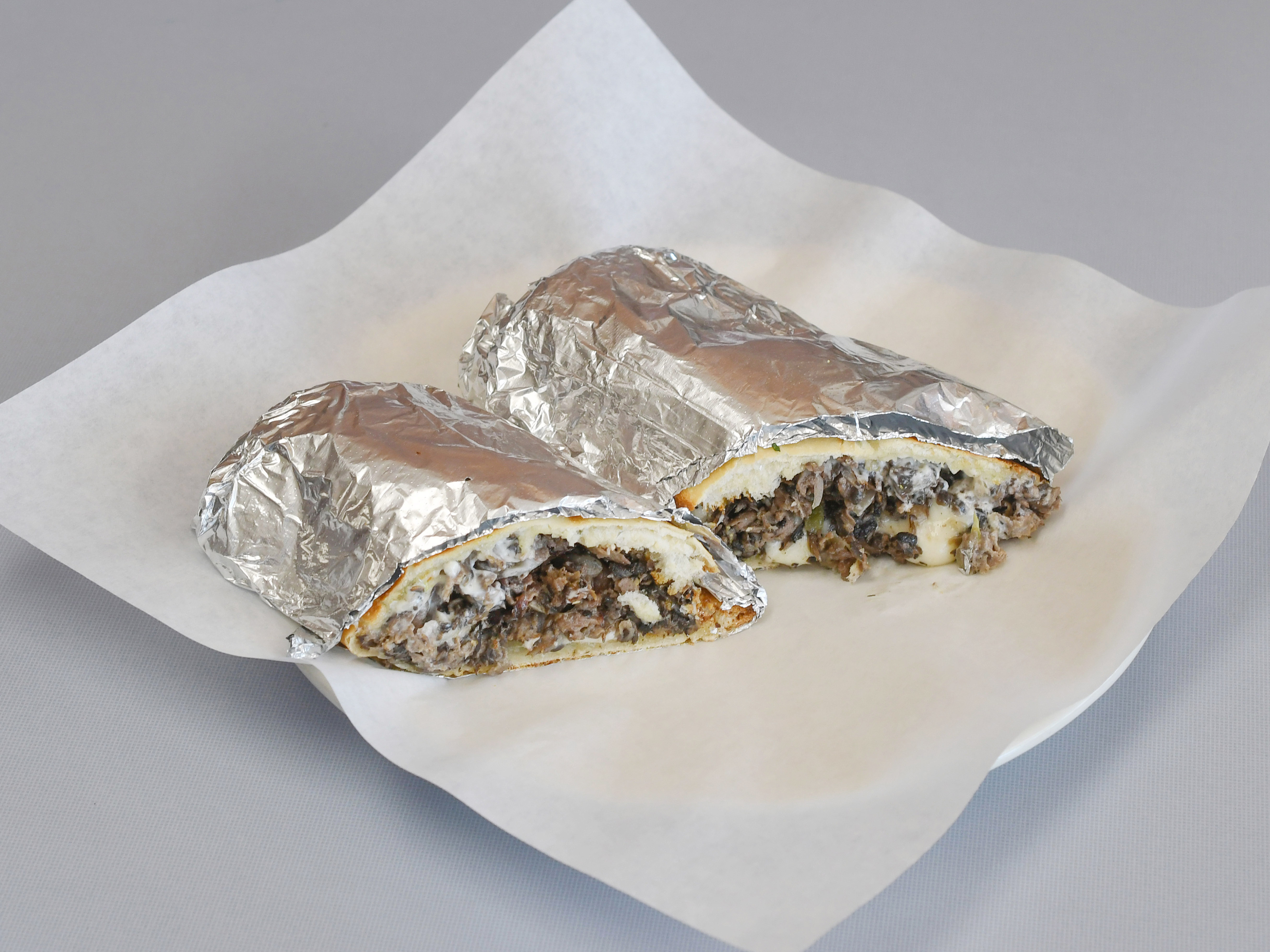 Order Philly Cheesesteak food online from Milano Pizza & Greek Deli store, Manteca on bringmethat.com