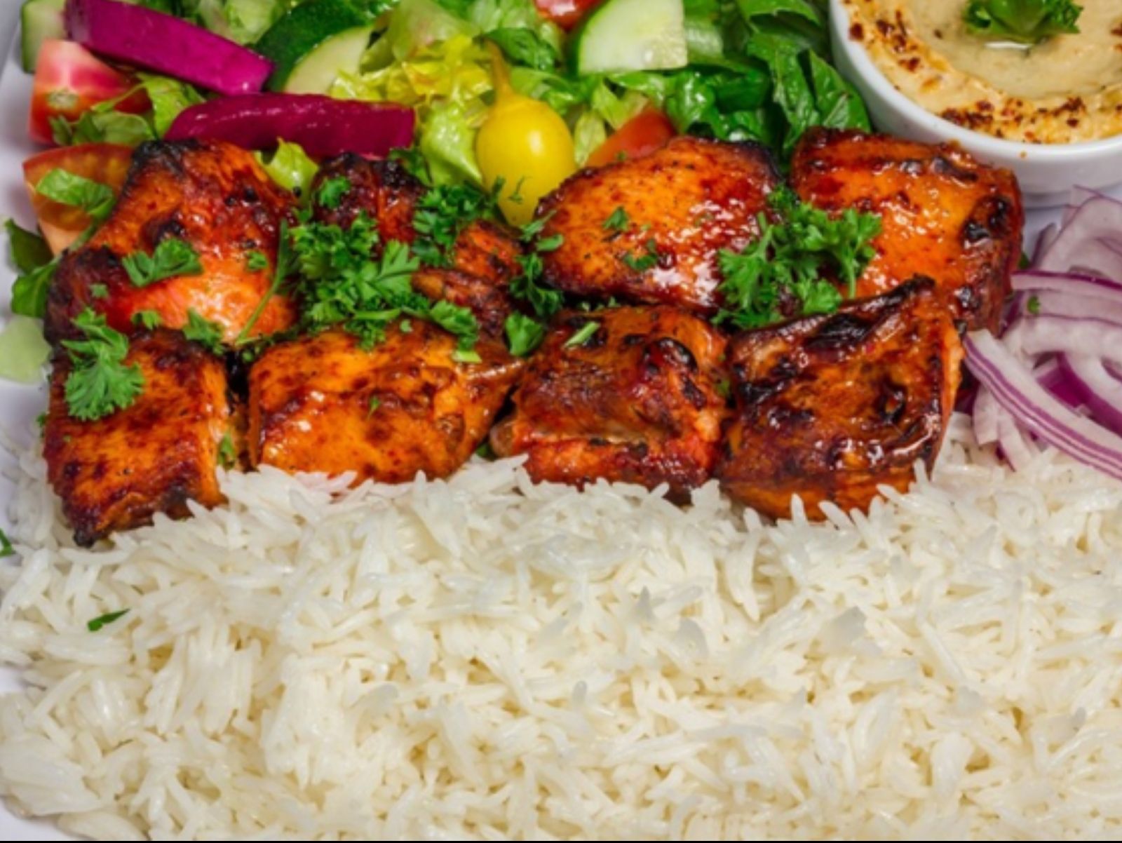 Order Chicken Tikka Boti Over rice food online from Kabab House store, Atlantic City on bringmethat.com