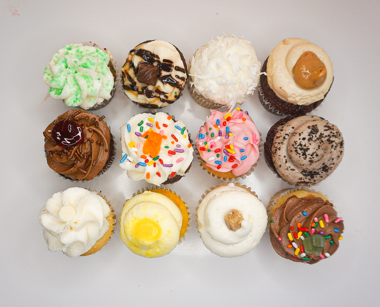 Order 2 Dozen Mini Cupcakes food online from Little Miss Cupcape store, Hyannis on bringmethat.com