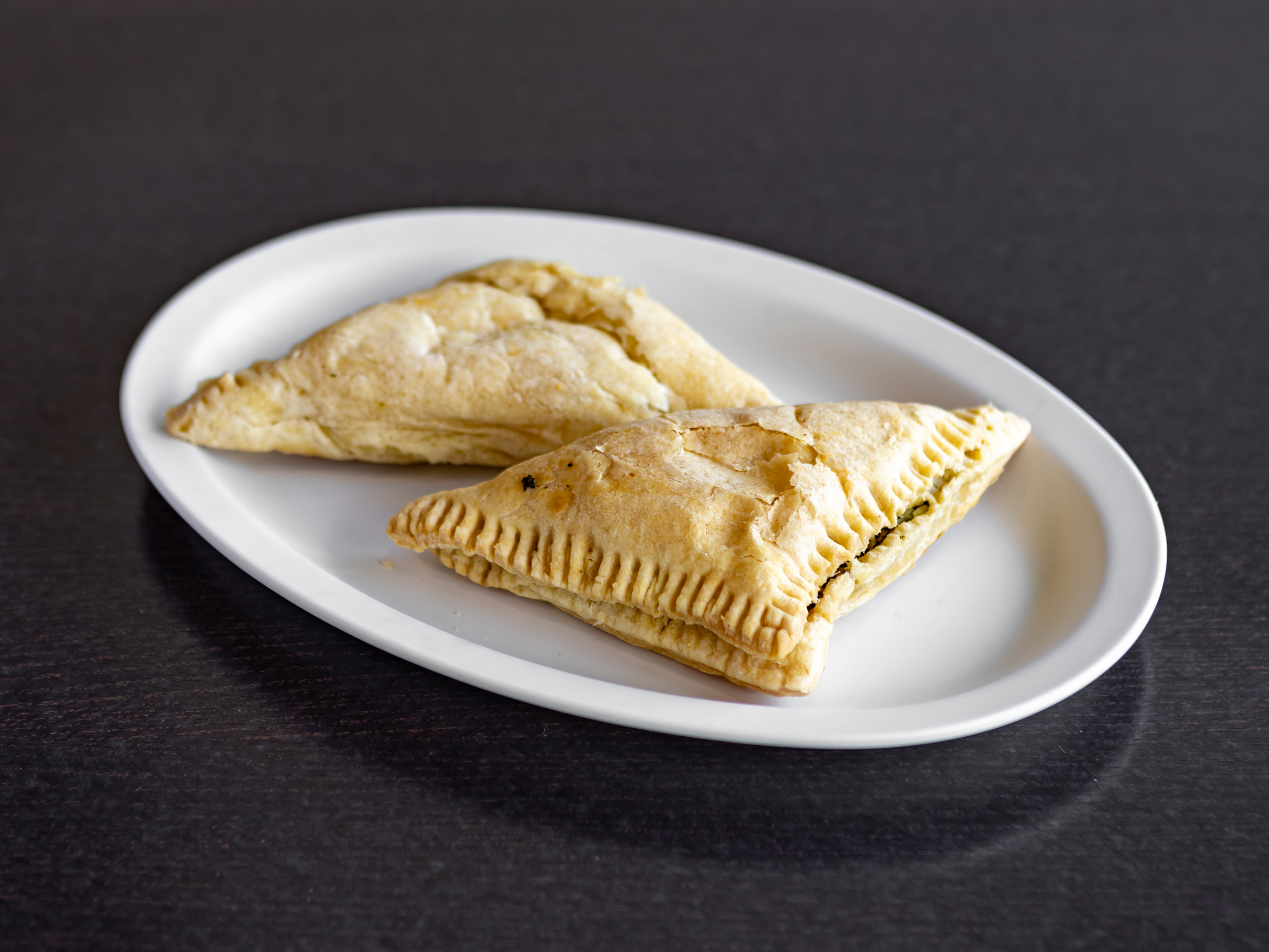 Order Spanakopita (2 pieces) food online from Mikonos Grill store, Milpitas on bringmethat.com