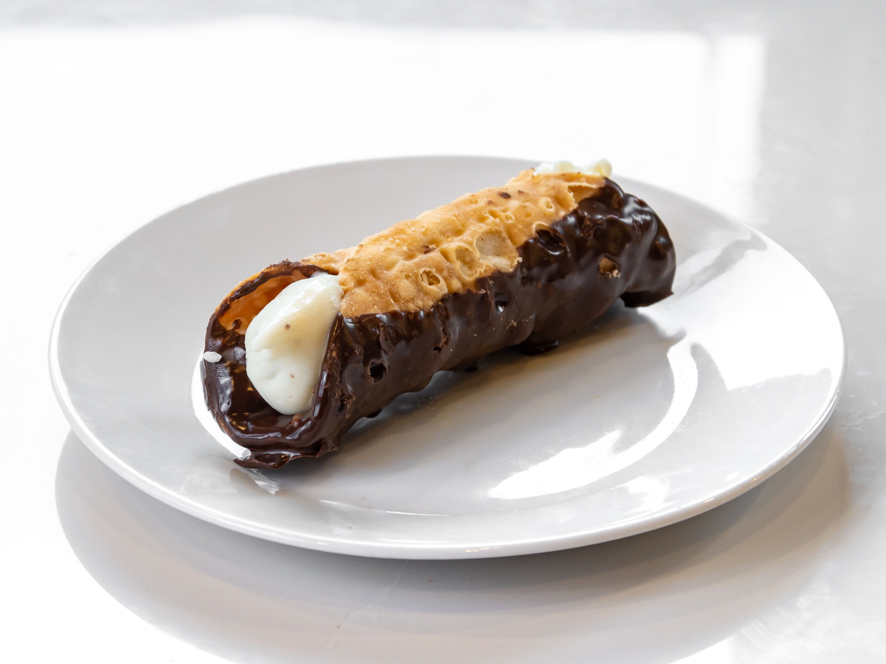 Order Cannoli food online from New Yorker Pizza store, Leesburg on bringmethat.com