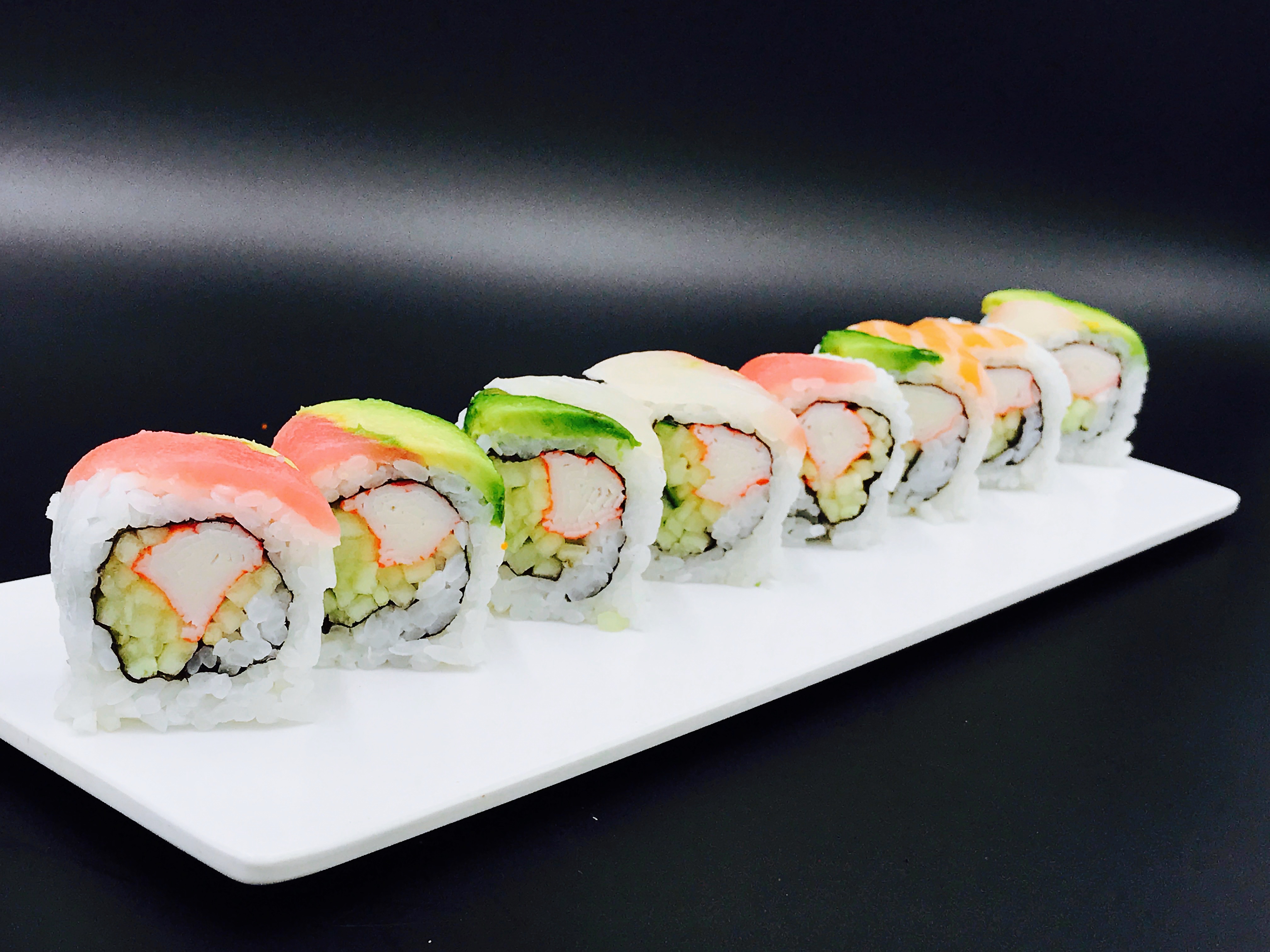 Order Rainbow Roll food online from Sushi King store, Charlottesville on bringmethat.com