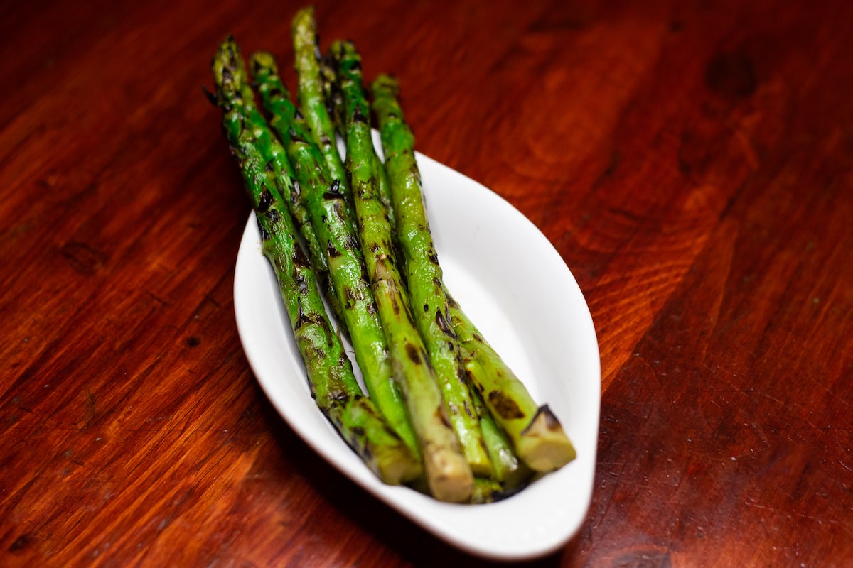 Order Wood-Grilled Asparagus food online from Tahoe Joe's  store, Fresno on bringmethat.com