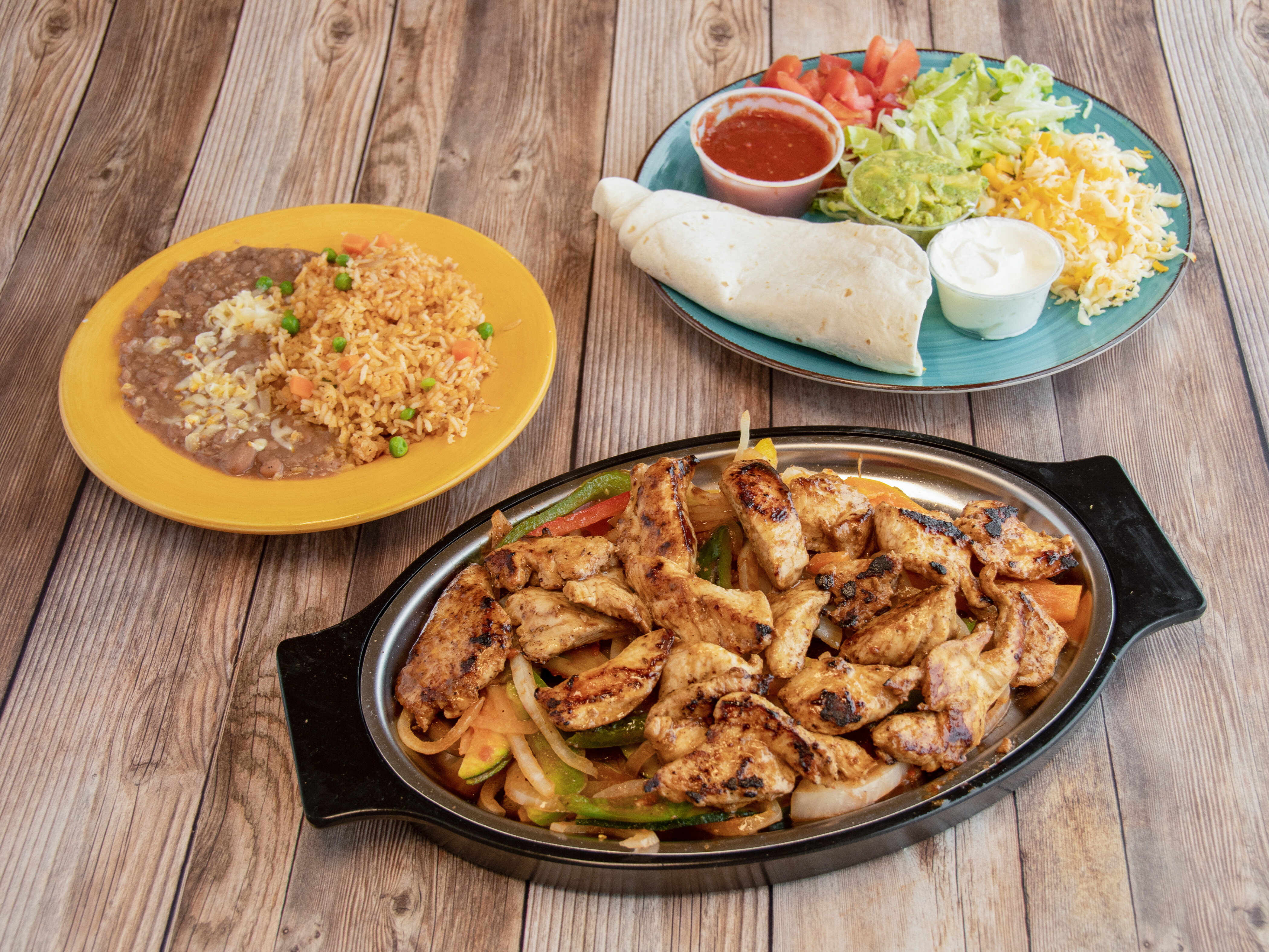 Order Fajitas Dinner food online from Trini Mexican Carry Out store, New Baltimore on bringmethat.com