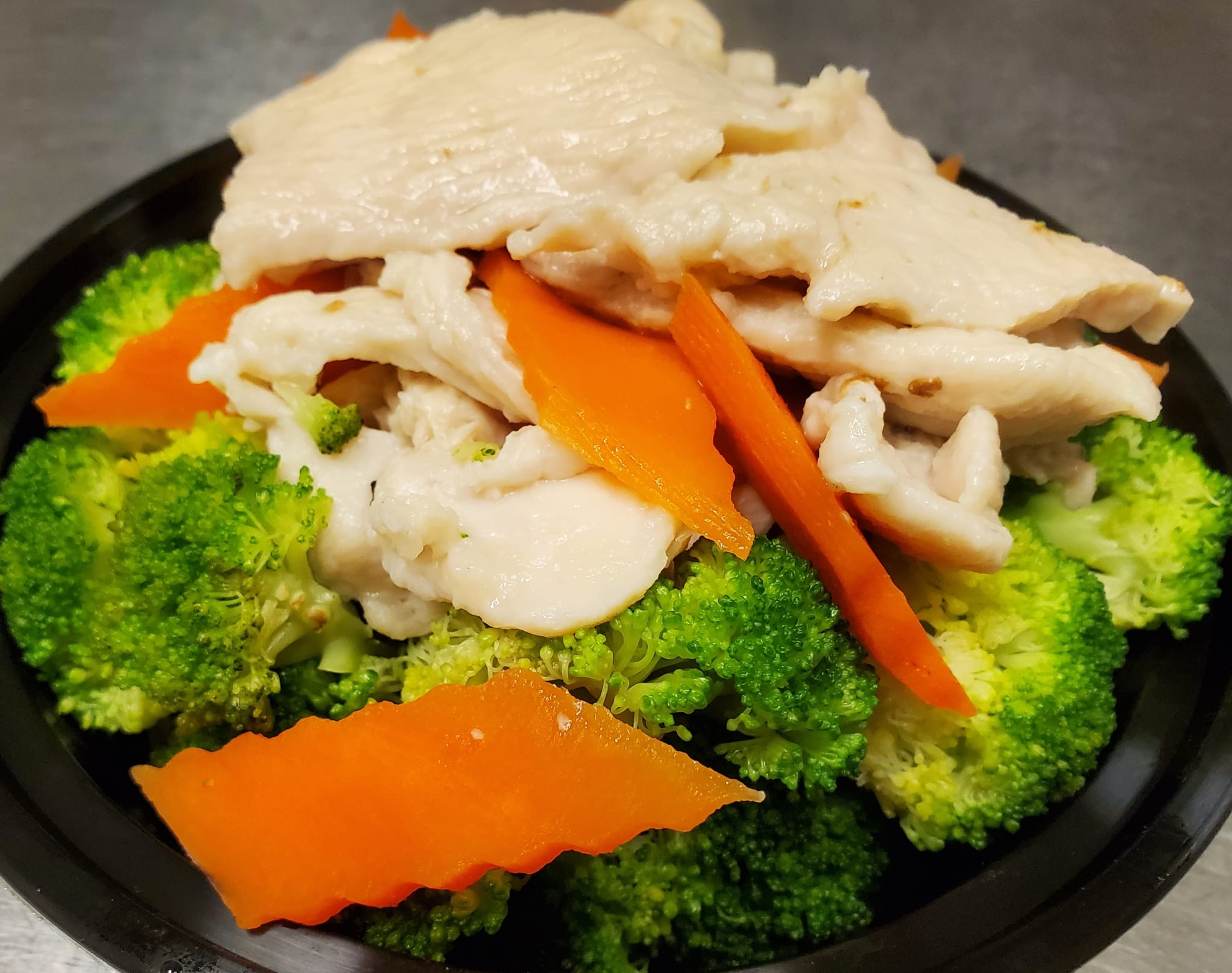 Order Steamed Chicken with Broccoli food online from Panda Kitchen store, Houston on bringmethat.com