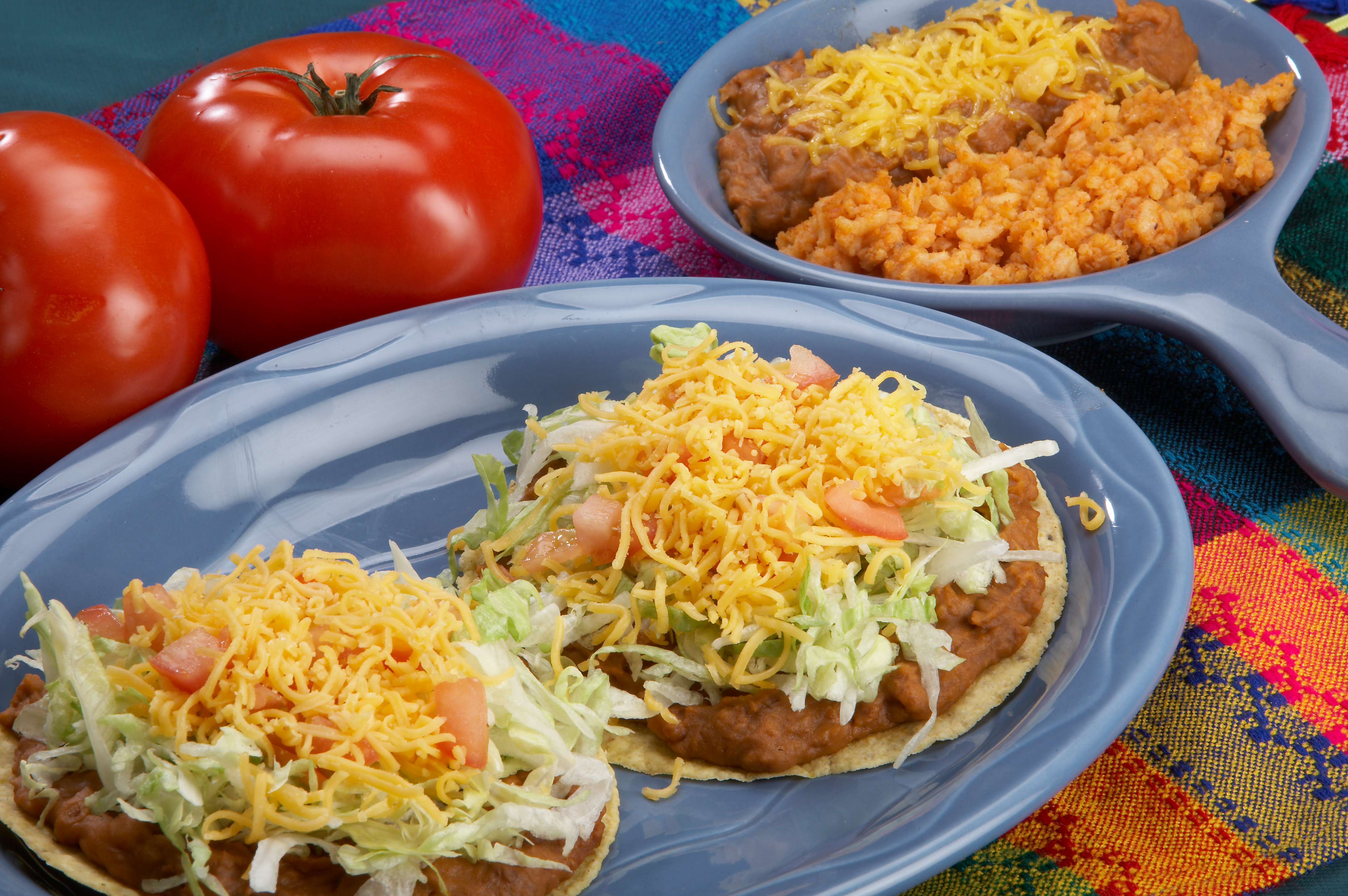 Order 2 Bean Tostadas food online from Rudy's Tacos store, Davenport on bringmethat.com