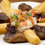 Order Yuca con Chicharon food online from Dona Tere Restaurant store, Woodbridge on bringmethat.com