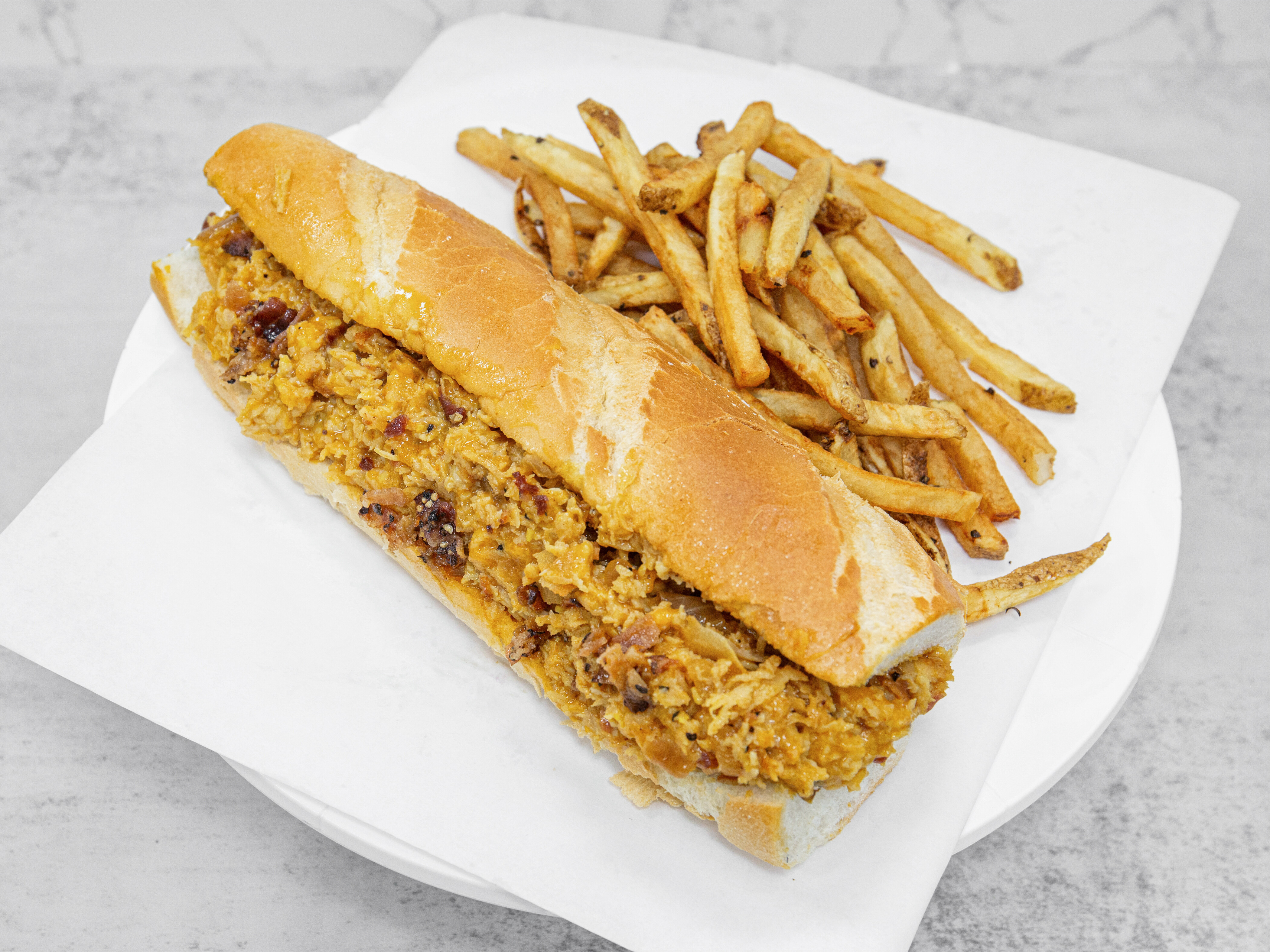Order Chicken Cheesesteak Sandwich food online from Cav 2 Go store, Philadelphia on bringmethat.com