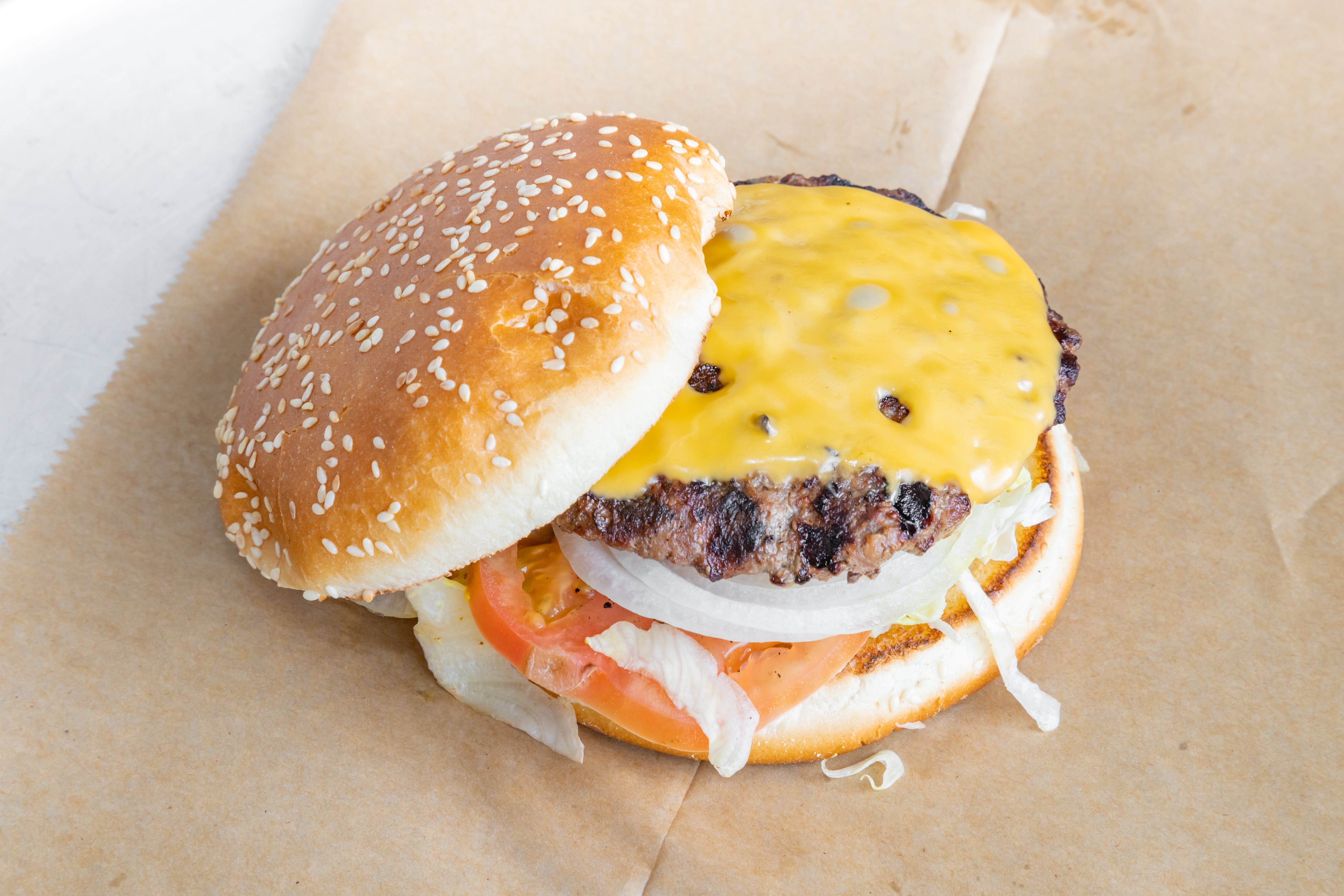 Order Cheeseburger - Burger food online from Emilio's Pizza store, Burbank on bringmethat.com