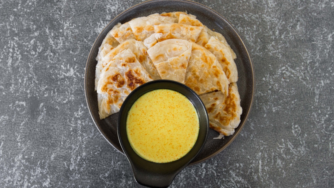 Order Paratha with Coconut Curry Dip food online from Inle Burmese Cuisine store, San Francisco on bringmethat.com