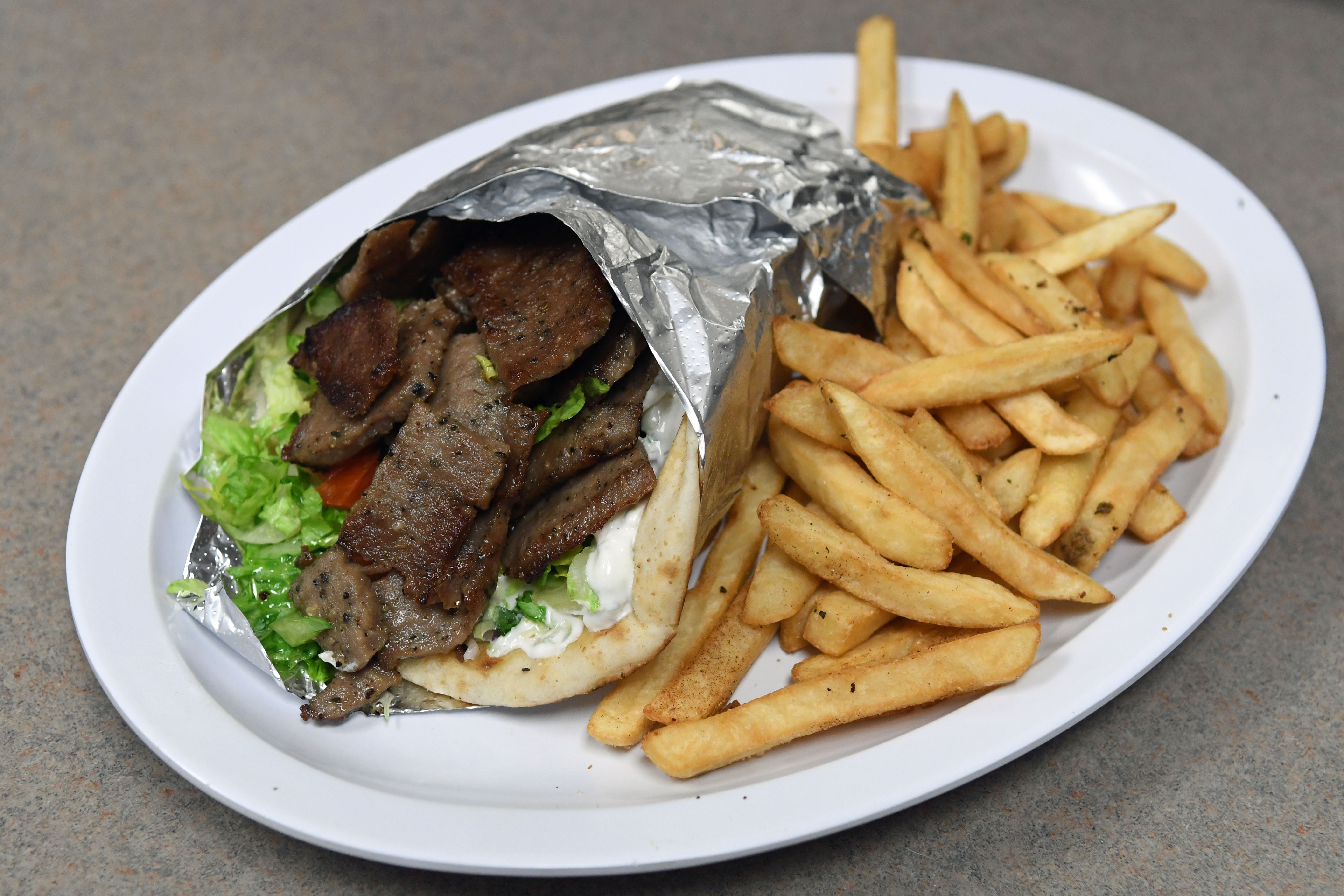 Order Grilled Chicken Gyro food online from Your Greek Cousin store, West Palm Beach on bringmethat.com