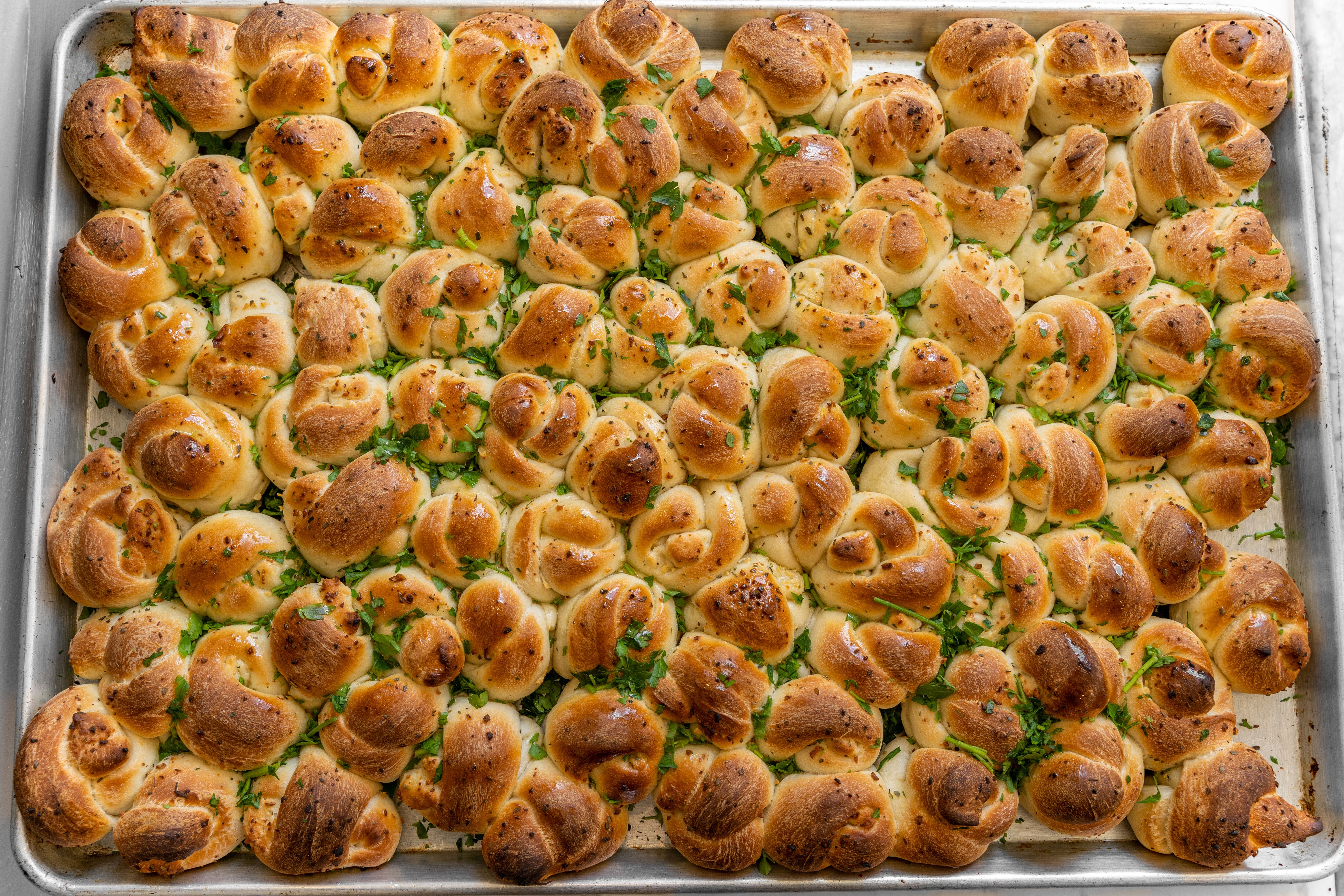Order Garlic Knots - 5 Pieces food online from Roma's pizza store, New York on bringmethat.com
