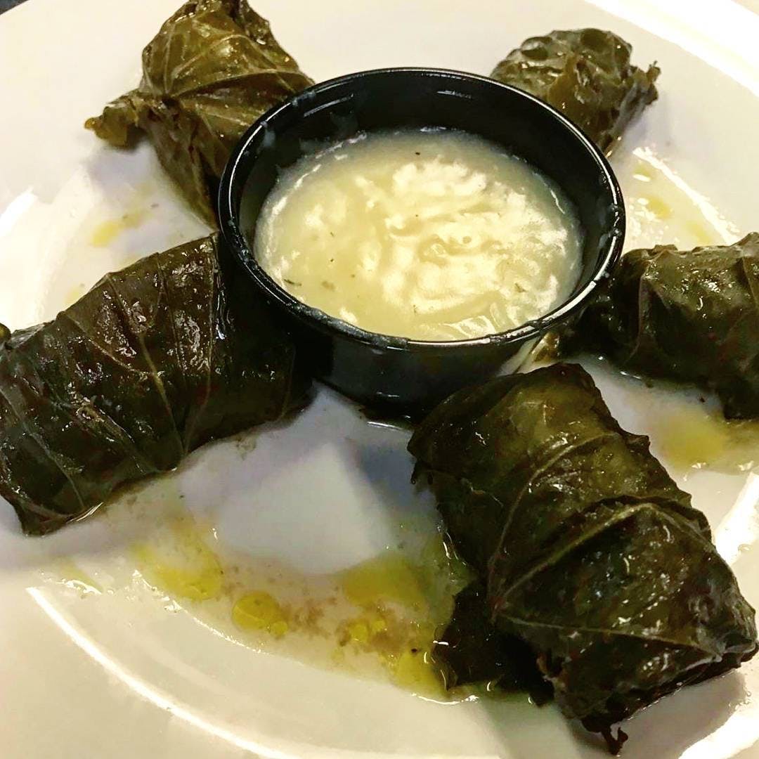 Order Grape Leaves - Appetizer food online from Holiday Pizza store, Statesboro on bringmethat.com