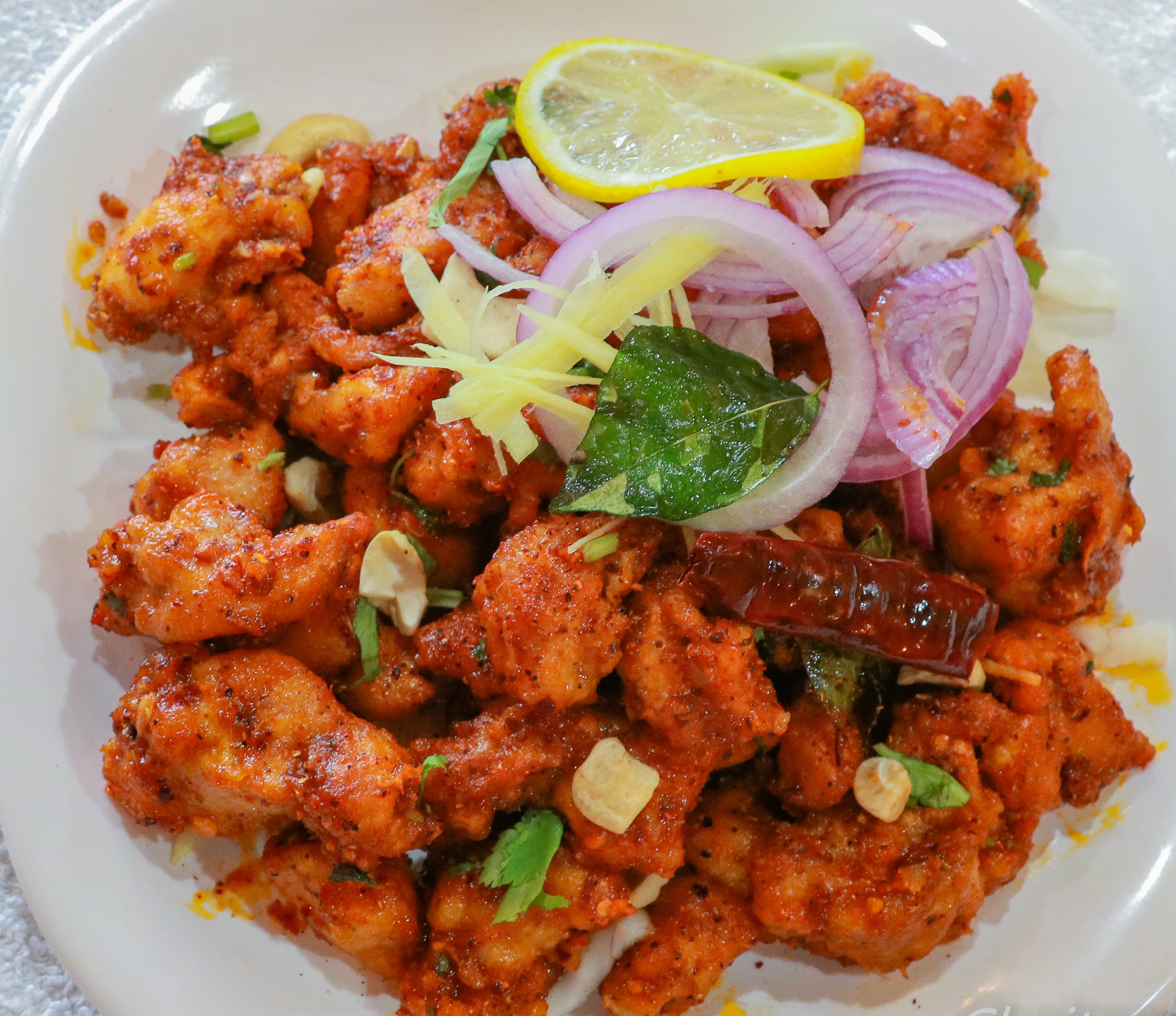 Order Karampodi Kodi food online from Bawarchi Biryanis Indian Cuisine store, Mason on bringmethat.com